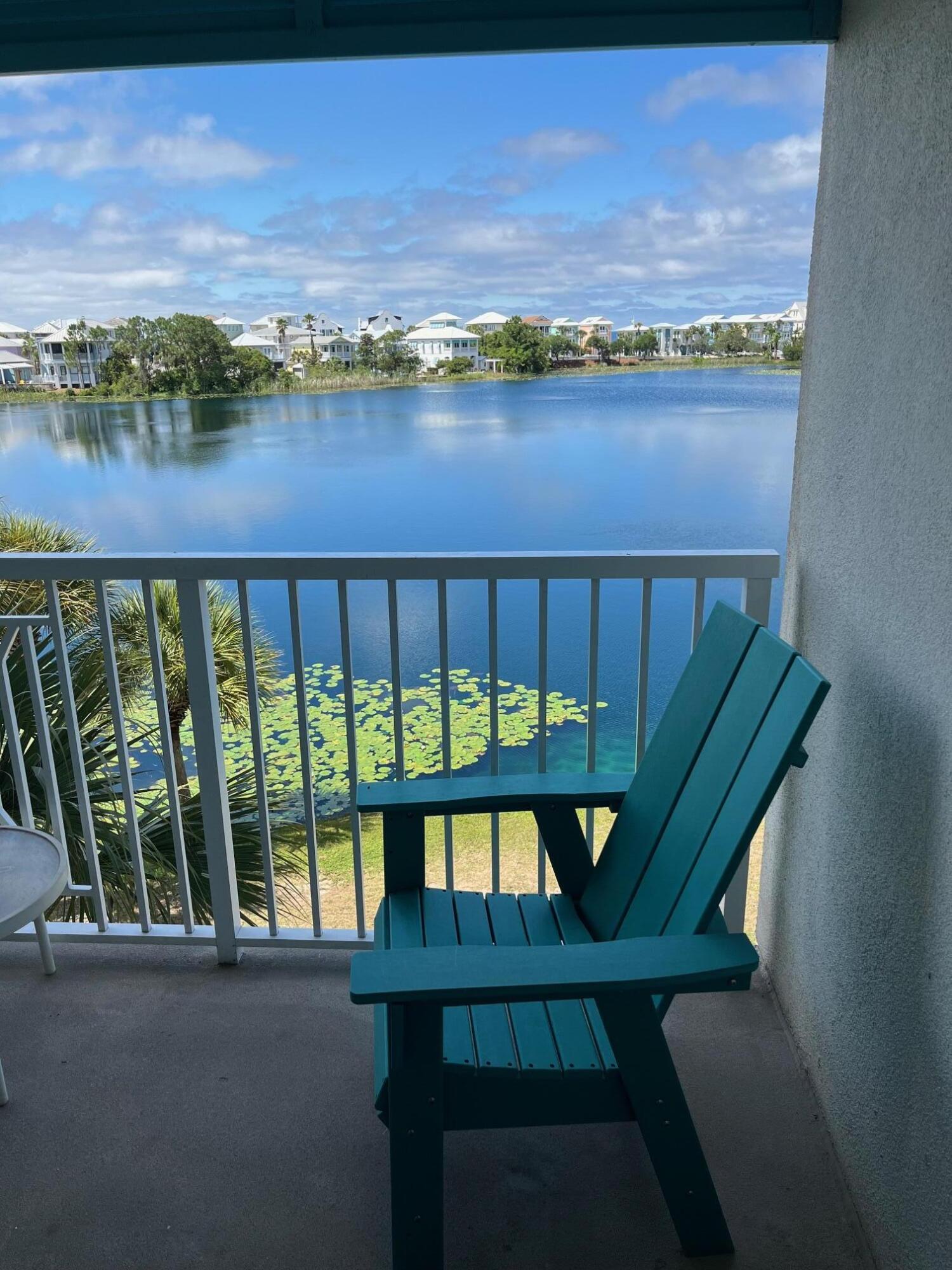 Welcome to Carillon Beach, one of the most sought after communities on the Gulf Coast. Featuring a cozy, yet functional living layout and a private balcony with expansive lake views. This is a wonderful personal getaway or investment property. The owner installed upgraded porcelain floors, fresh paint and even an electric fireplace! There are several newer furniture items within the interior and the balcony that convey. Carillon Beach has a walkable downtown area with a coffee shop and wine bar, the famously known Beach Cafe, Pilates, Fitness Center, a full service Salon and a store for your convenience. There are four pools to choose from, one being gulf front and one being the Resort Pool, which is dedicated to the condos. It includes two hot tubs and a full dressing/shower bathroom. Carillon Beach also has Basket Ball and Pickle Ball Courts for your enjoyment, and there is nearly one mile of pristine beach within the community! Don't wait for your own piece of paradise!