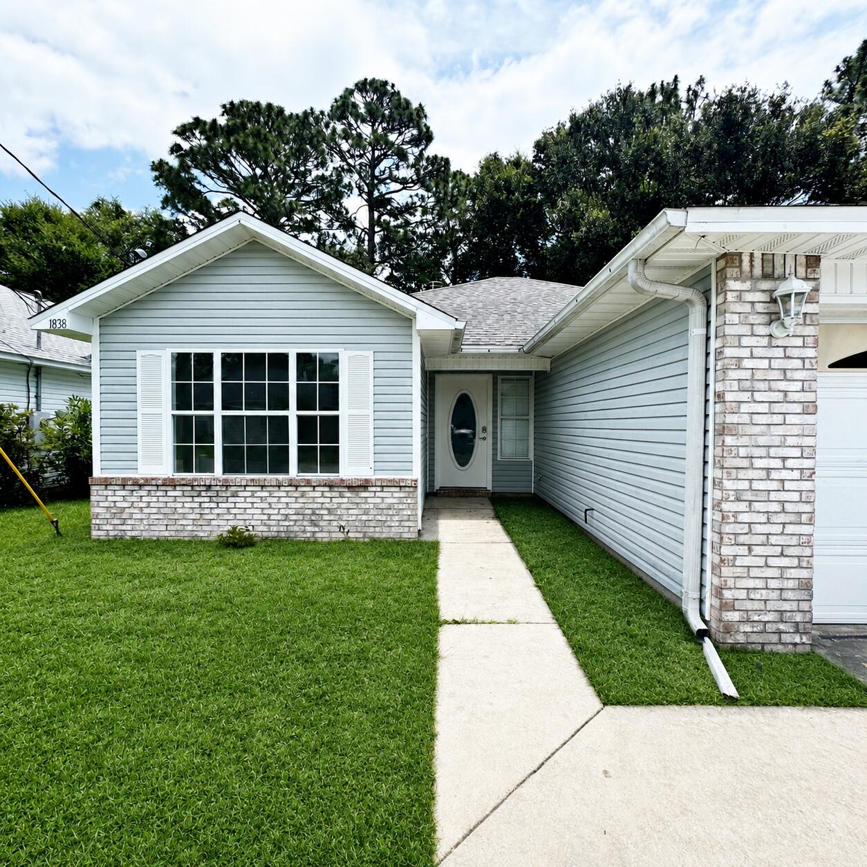 ASSUMABLE 4.50% VA LOAN TO QUALIFIED BUYER(S). Extensively updated throughout--A Must See! WELCOME to this move-in ready Fort Walton Beach home, conveniently located near major employment centers, shopping, dining, recreation, and area military installations. Step through the front door into an inviting entryway that opens to a spacious living room featuring a cozy fireplace for relaxing evenings. LVP flooring extends throughout the main living areas, and all three bedrooms creating a clean and durable finish. The kitchen showcases beautiful granite countertops, white cabinetry, abundant natural light, and an open layout that flows seamlessly into both the dining area and living room--ideal for everyday living and entertainment. The primary bedroom offers generous space, an updated en-suite bath, and a sizable closet. Two additional bedrooms provide flexible space for a variety of needs and share a second full bathroom. The owner invested more than $20,000 in updates: recent interior paint adds a fresh touch throughout the home, LVP flooring throughout, ceiling fans, new microwave, new vanity, interior doors refurbishment, LED lighting, and much much more. Lastly, as an added convenience, the garage is now heated and cooled, adding an addition 400 sq ft for optional use. The new roof was install in November 2018, water heater in 2022, and HVAC installed 2014. Move-in ready and waiting for its next owner!