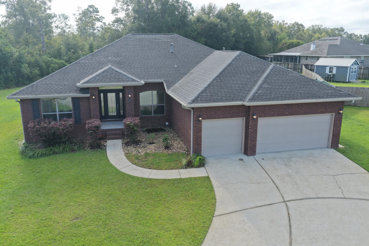 Explore a 2.25% VA loan assumption opportunity, subject to lender approval and assumption terms for qualified VA-eligible buyers. Then discover the space that makes this Huntington home worth a closer look: four bedrooms, three full baths, a three-car garage and nearly half an acre on a cul-de-sac.
Built in 2015, this brick home brings people together in a generous great room while a triple-split bedroom layout creates welcome separation. A dedicated dining room is ready for gatherings, and a separate flex room gives you space for a home office, reading room or everyday retreat. Granite counters, a gas range, a pantry and a breakfast nook make the kitchen as practical as it is inviting. High ceilings and arched openings add character throughout the main living areas.
The primary suite offers two closets, dual vanities, a soaking tub and a separate shower. Three additional bedrooms and two additional full baths give guests and everyday routines room to spread out. Step onto the covered patio for an easy outdoor break, with a spacious yard beyond and a storage shed for tools and seasonal gear. The third garage bay adds another option for parking, storage or hobbies.
A flexible floor plan, generous outdoor space and a low-rate assumption opportunity come together at 1315 Ballistic Tip Court. Cash and other financing options are also welcome. Schedule a showing to experience how the spaces connect.