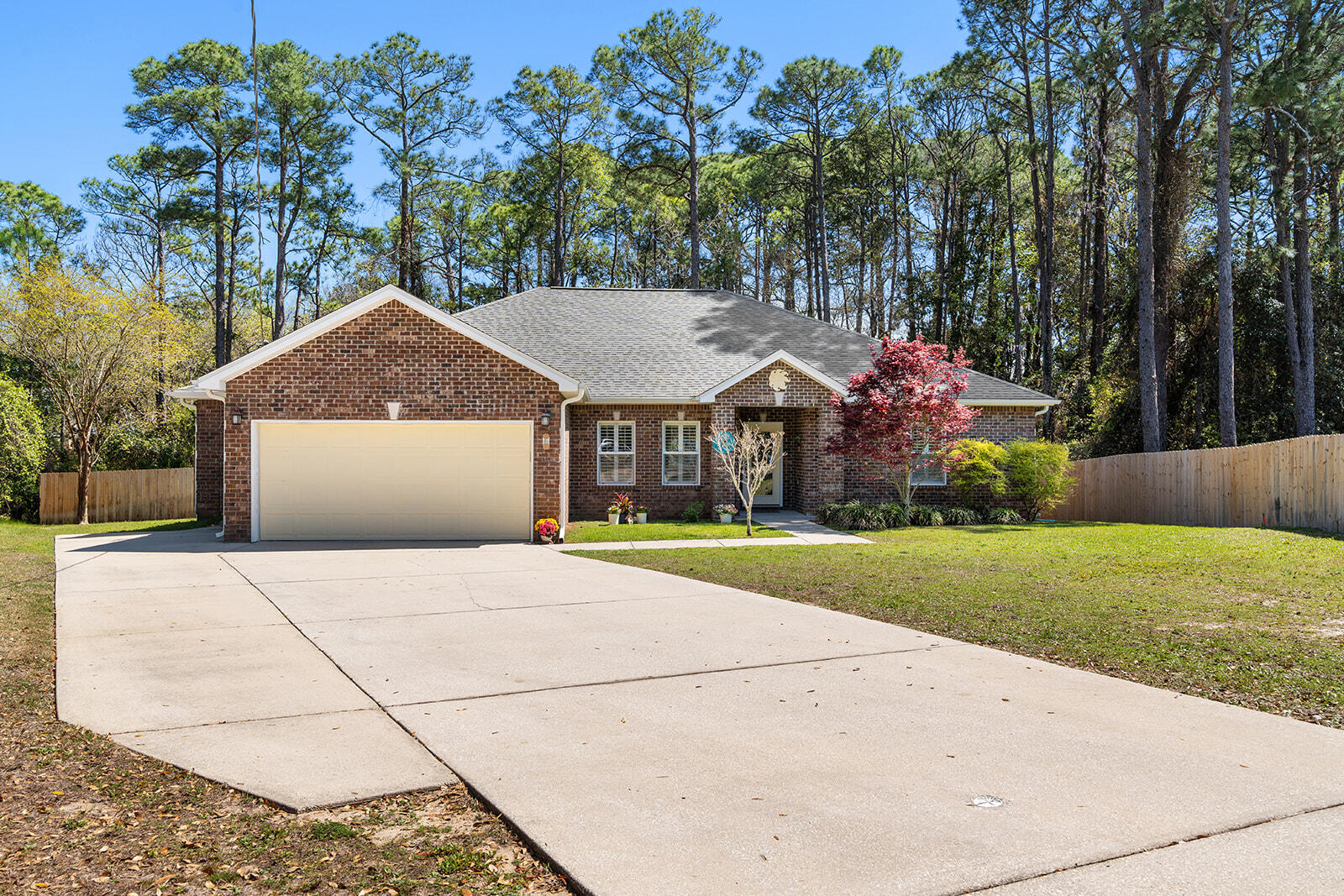 Beautifully Maintained One-Owner Home in Shalimar
This all-brick, split floor plan home offers timeless style and thoughtful updates throughout. The spacious living area features tray ceilings, while the kitchen boasts granite countertops, ample cabinetry, and a breakfast bar with both formal and casual dining spaces.
The private master suite includes dual walk-in closets with built-ins, double vanities, a garden tub, and a tiled shower. Two additional bedrooms are conveniently located near full baths.Enjoy the fenced backyard with covered porch, deck, and swim spa--perfect for relaxing or entertaining.