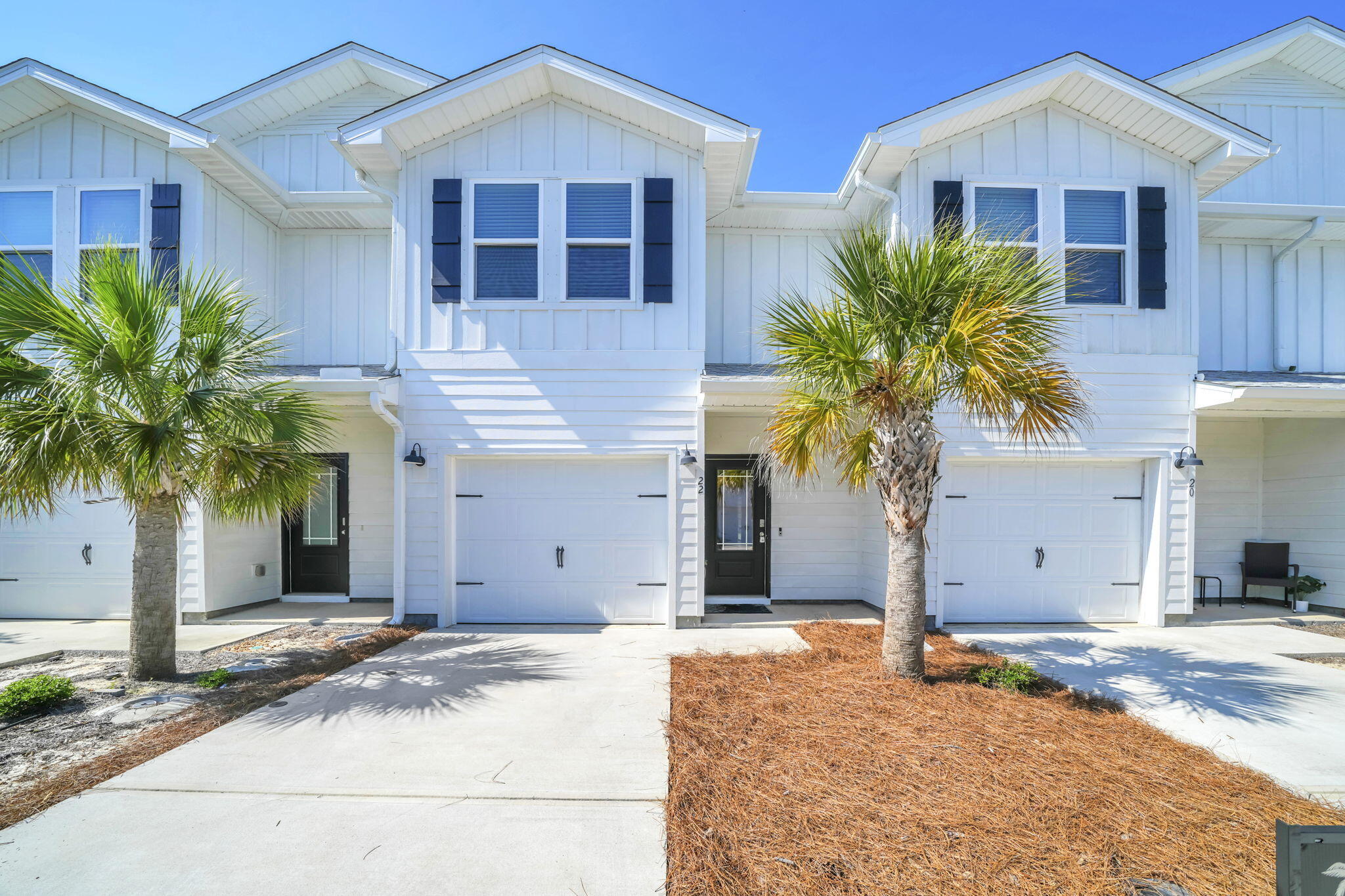 Welcome to Harbor Place Townhomes! This community located at the corner of Melvin St. and Azalea Dr. in Destin, FL. Just minutes from Emerald Grand and Crab Island. This interior unit is a  3 bed, 2.5 bath town home that has EVP flooring throughout the entire home, beautifully stained hardwood stairs to bring out the beachy feel of the home.  Features include: farmhouse style sink, stainless steel dishwasher, range and microwave, quartz countertops and beautiful white cabinetry with brushed nickel hardware.  Perfect location to get to the beach, shopping, restaurants and the elementary school in under 10 minutes! ***Home is NOT furnished.