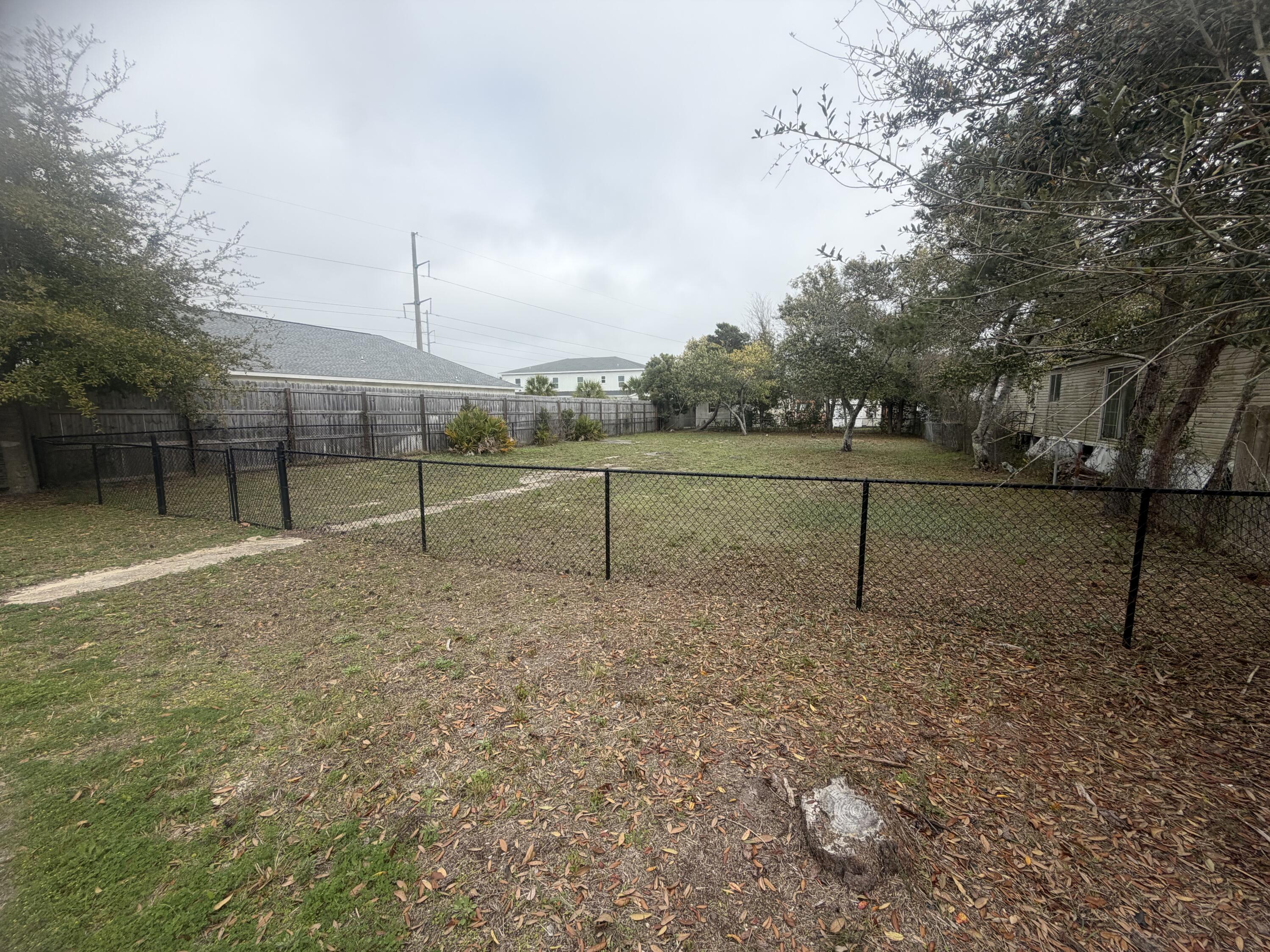 Great Location cleared lot just N of Back Beach Rd, the lot is adjacent to the Laguna Haven Community entrance with newer construction. Great spot to build your dream home or rental investment.