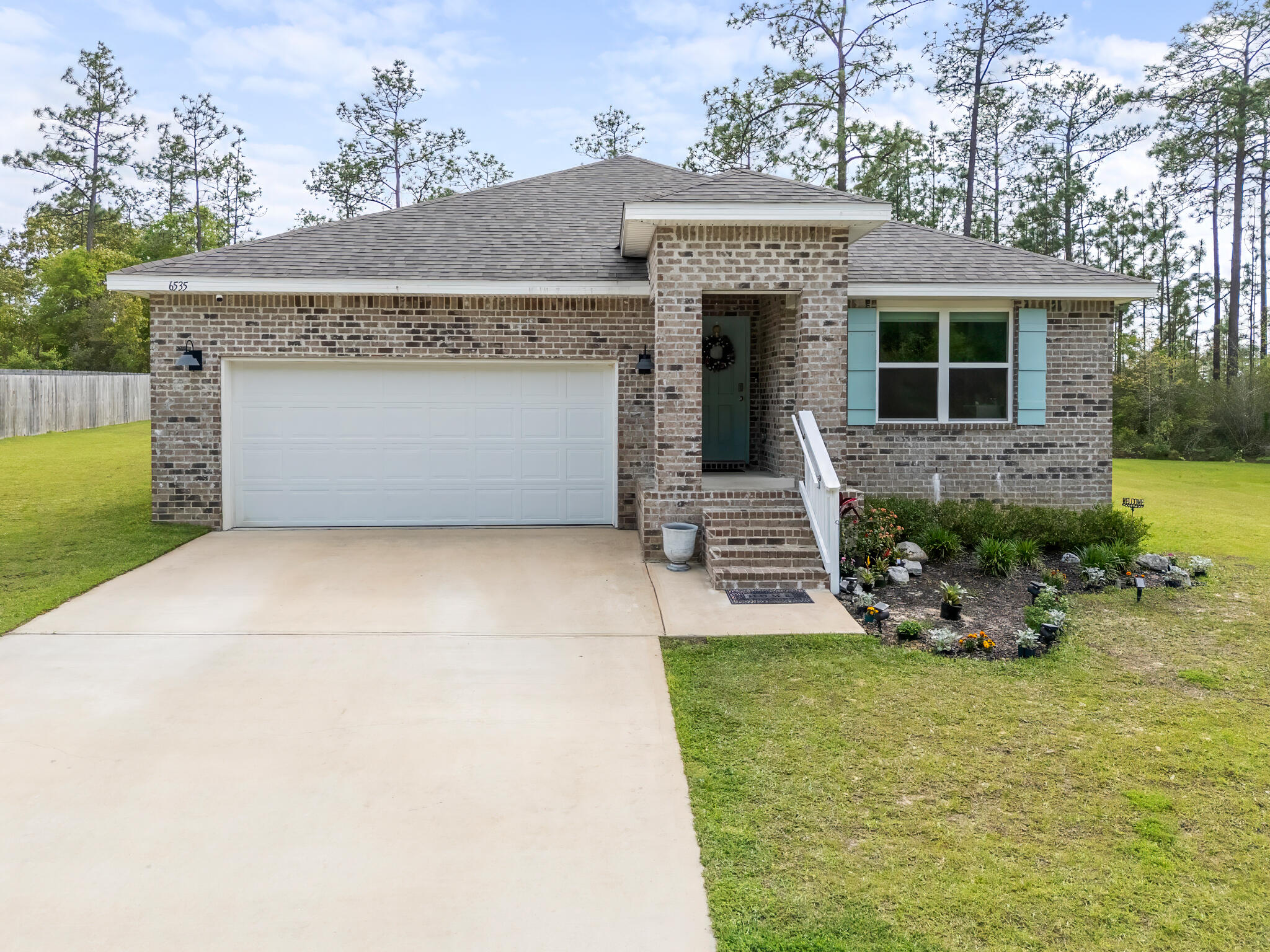 VA Compromise Short Sale Approved. List price reflects the approved short sale terms and required net proceeds. Seller's lender has approved up to 1% toward buyer closing costs.

Nestled along the peaceful, tree-lined streets of Heritage Plantation, this all-brick 4-bedroom, 2-bathroom home sits on a premium lot that backs up to a protected wooded preserve, offering a rare level of privacy and natural beauty. With approximately 0.419 acres, the property extends an estimated 12 feet into the preserve, creating a serene backdrop you won't find just anywhere. Elevated along one of the neighborhood's more scenic stretches, the home also captures views of Heritage Plantation's gently winding roads and rolling terrain.

Inside, the home offers a bright, welcoming feel with a functional semi-open layout designed for everyday living. Three well-sized bedrooms, a full guest bath, and the laundry area are positioned toward the front of the home, while the owner's suite is tucked away in its own private wing. The spacious primary suite features two large closets, a double vanity, a walk-in shower, and ample space to comfortably accommodate a king-sized bed.

The kitchen serves as the central gathering point, complete with white cabinetry and a center island that opens to a cozy dining area. Just beyond, a covered patio provides a quiet outdoor retreat overlooking the expansive backyard and lush greenbelt.

Located in Heritage Plantation, residents enjoy a balance of peaceful living and convenient access to nearby shopping, dining, and schools in Crestview, along with neighborhood amenities such as a community pool. Combining a desirable floorplan, a standout lot, and a tranquil setting, this home presents a unique opportunity within one of Laurel Hill's most sought-after communities.