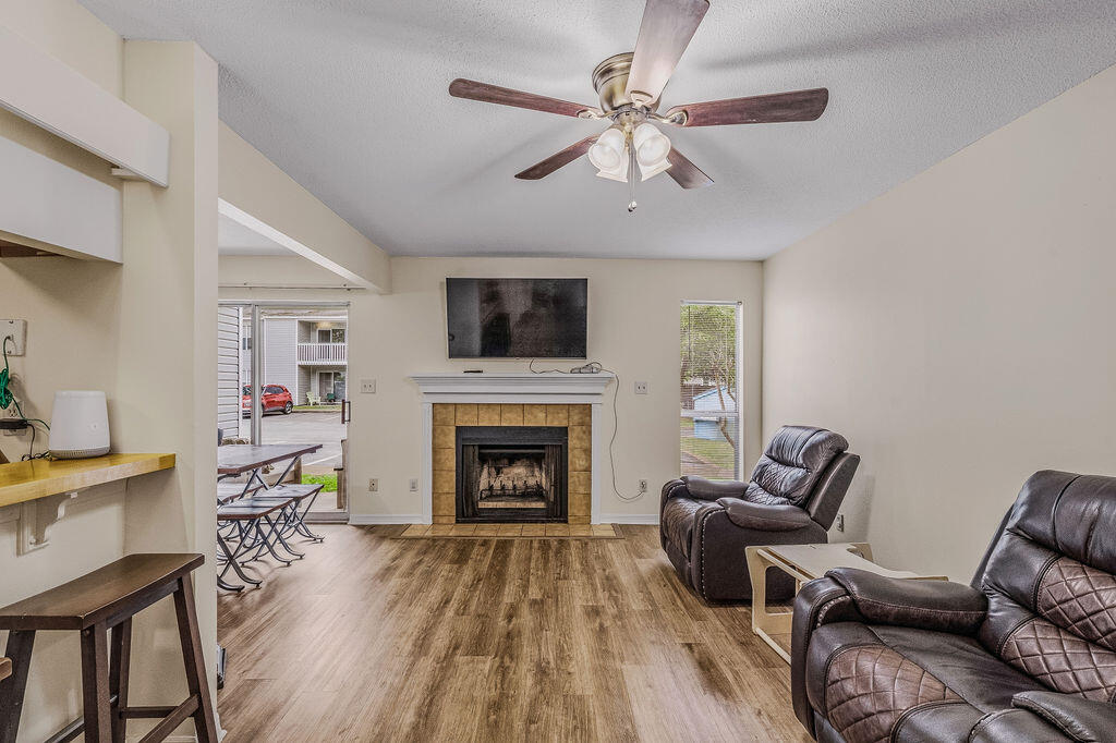 Nice 1 story condo in the middle of FWB, close to both bases, hospital, schools, shopping, restaurants, EVERYTHING! Pretty lvp floors throughout- no carpet! Wood burning fireplace in the living room. All kitchen appliances in place w/ a pantry, breakfast bar & separate dining area. All electric! Outside you have a covered back patio great for relaxing & entertaining w/ a partially privacy fenced community backyard. Covered front porch w/ storage closet for your extra stuff.