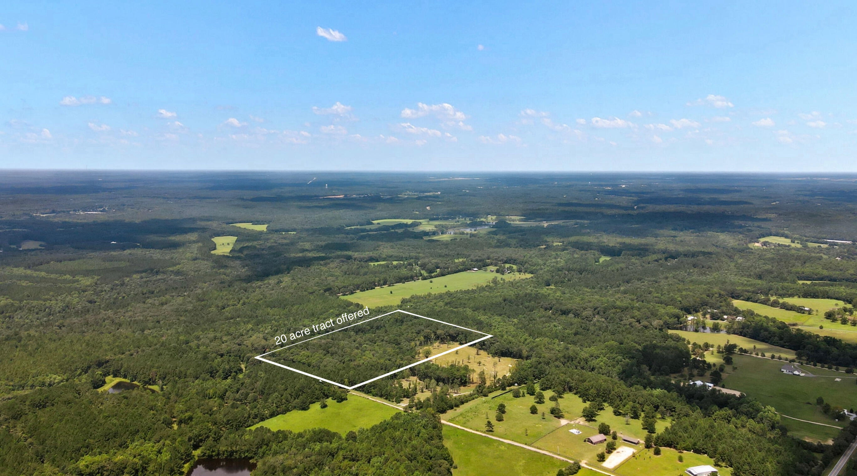 A rare opportunity to own +/-20 acres in Walton County and being only 30 min to SRB. This land offers unmatched character with rolling hills, a peaceful valley setting, and a blend of unique landscapes that feel both private and expansive. Tucked at the end of a private road, the property showcases a diverse mix of natural beauty: a lush evergreen forest, and a canopy of towering hardwoods accented by massive, centuries-old live oaks. The land has been thoughtfully maintained, preserving its stately trees and mature landscape.