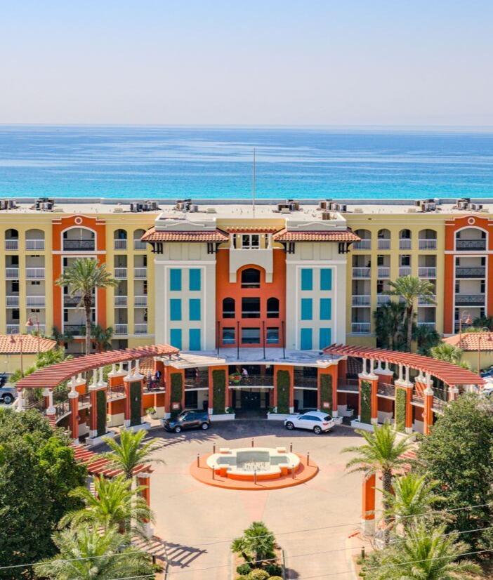 This beautifully situated 3-bedroom, 2-bath condo offers convenient first-floor living with effortless access to the Gulf -- just steps from the emerald waters and sugar-white sandy beaches.

Azure is a truly special destination where you and your family can create unforgettable memories. Designed for both relaxation and recreation, the community features two sparkling pools, two hot tubs, a well-equipped fitness center, and, most importantly, direct beach access just moments from your door. Enjoy the convenience of being within walking distance to the boardwalk, featuring the Gulfarium, restaurants, and a variety of shops.

Whether you're enjoying a peaceful morning by the water or a fun-filled day in the sun, this coastal retreat delivers the perfect blend of comfort, convenience, and coastal lifestyle.