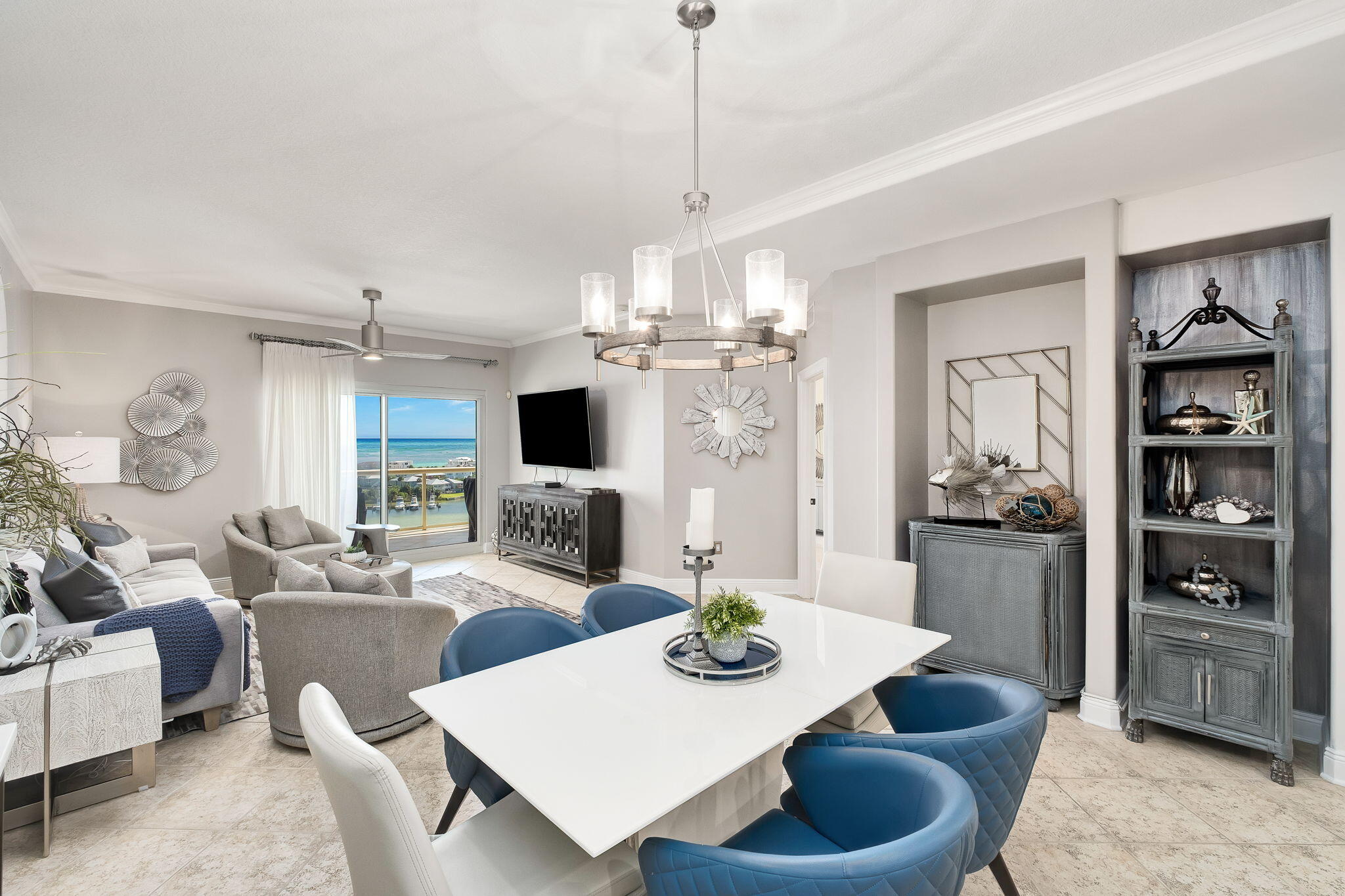 Experience elevated waterfront living at Marbella, one of Destin's premier harborfront residences, ideally positioned atop a scenic 35-foot bluff overlooking the iconic Destin Harbor. This beautifully renovated residence offers an exceptional vantage point with expansive Gulf, bay, and harbor views, including views toward Crab Island.

Designed with both everyday comfort and entertaining in mind, the spacious three-bedroom layout includes a versatile media room that can easily serve as a fourth bedroom, home office, or flex space. Thoughtful updates throughout include new countertops in the kitchen and all bathrooms, new lighting and toilets throughout, and a newly updated kitchen appliance package featuring an induction range, microwave, and oven. Newer HVAC and water heater systems add additional peace of mind.

The expansive private veranda is a true extension of the living space, capturing remarkable waterfront views from its uniquely positioned location. From morning light across the harbor to boats returning at sunset, the backdrop is constantly changing.

Marbella offers an impressive collection of amenities including a 58-slip marina, waterfront resort-style pool and hot tub, fully equipped fitness center, and owners' lounge. Two assigned parking spaces and a sizable private storage unit convey with the residence.

For the boating enthusiast, an exceptional 70FT BOAT SLIP is available for purchase separately in conjunction with the sale of the residence, creating a rare opportunity to pair elevated waterfront living with direct access to Destin Harbor and the Gulf beyond.

Spacious, beautifully updated, and positioned to take full advantage of some of Marbella's most impressive views, this residence offers a distinctive opportunity to experience the Destin waterfront from a beautiful and unique perspective.