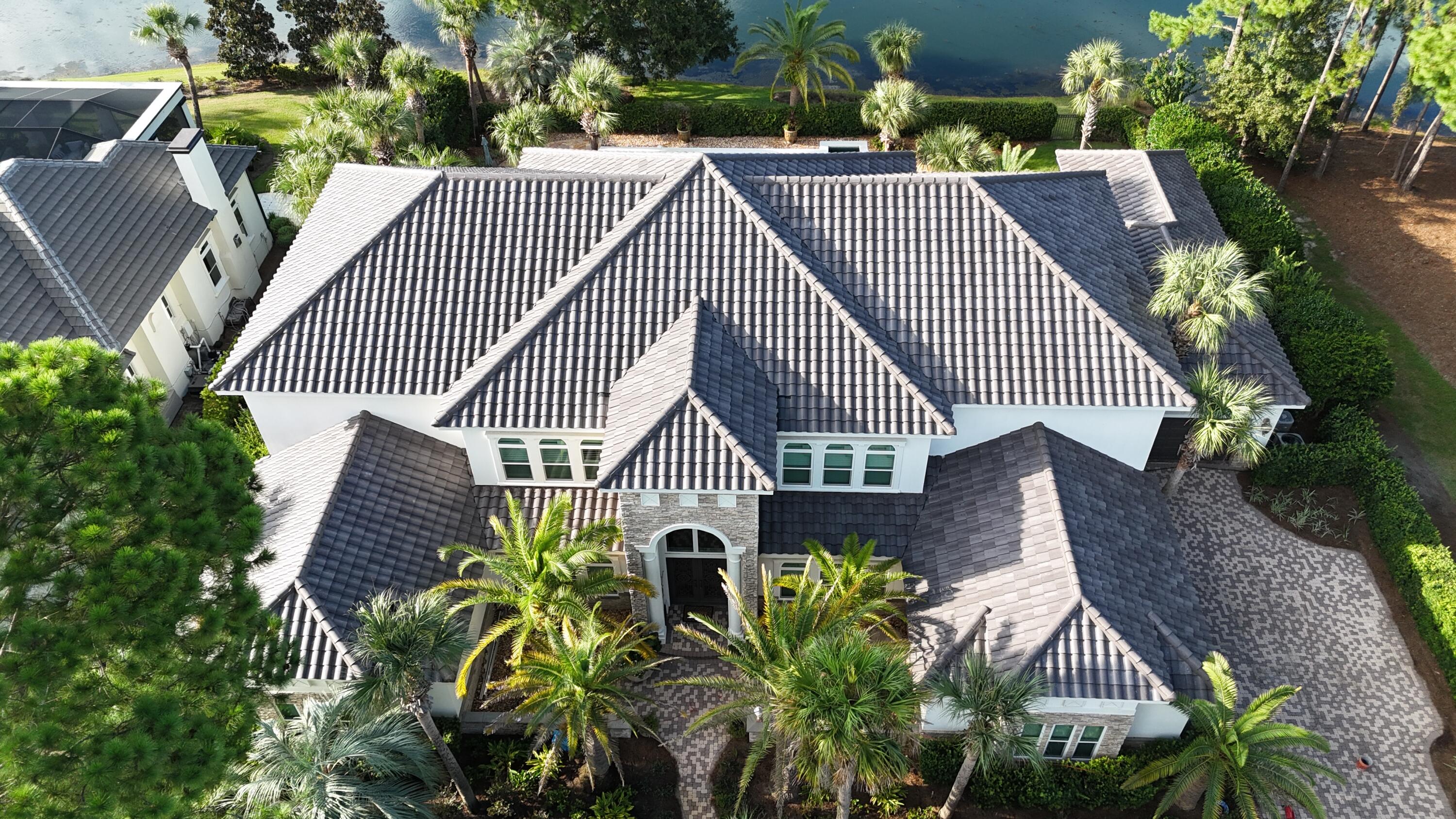 Luxury, privacy, and timeless coastal living come together in this exceptional residence located in the prestigious gated community of Burnt Pine at Sandestin Golf and Beach Resort. Situated on an expansive lot this homesite offers serene lake views, this impressive four-bedroom residence offers an extraordinary combination of space, comfort, and resort-style living. This home is designed for both elegant entertaining and relaxed everyday living.A dramatic foyer welcomes you into an expansive interior featuring a generous great room, formal dining area, private office, sitting room, loft, and beautifully proportioned living spaces. Hardwood and tile flooring, plantation shutters, recessed lighting, custom millwork, and tray and coffered ceilings add architectural detail and sophistication throughout. The spacious kitchen  is designed for gathering, featuring a large center island, breakfast bar, abundant cabinetry, pantry storage, and direct connection to the home's main living areas. The oversized primary suite is located on the first floor and offers a peaceful retreat with a generous bedroom, luxurious bath, walk-in closet, dressing area, and additional spa-like features.Multiple additional bedrooms and living areas provide exceptional flexibility for family, guests, or entertaining. The home's thoughtful split-bedroom design allows for privacy while maintaining an inviting flow throughout the residence. Outdoor living is equally impressive, with an in-ground pool and tranquil water views creating a private setting for relaxing or entertaining. The expansive homesite provides a rare sense of space within Burnt Pine, while the attached oversized two-car garage offers ample room for vehicles, golf carts, storage, and the coastal lifestyle.
residents enjoy convenient access to world-class golf, beautiful beaches, dining, shopping, marina activities, tennis, and the many amenities that make the Sandestin lifestyle so desirable. The combination of a substantial residence, generous homesite, private pool, water views, and an exceptional location makes this  pristine residence  a truly distinctive opportunity in one of South Walton's most sought-after communities.