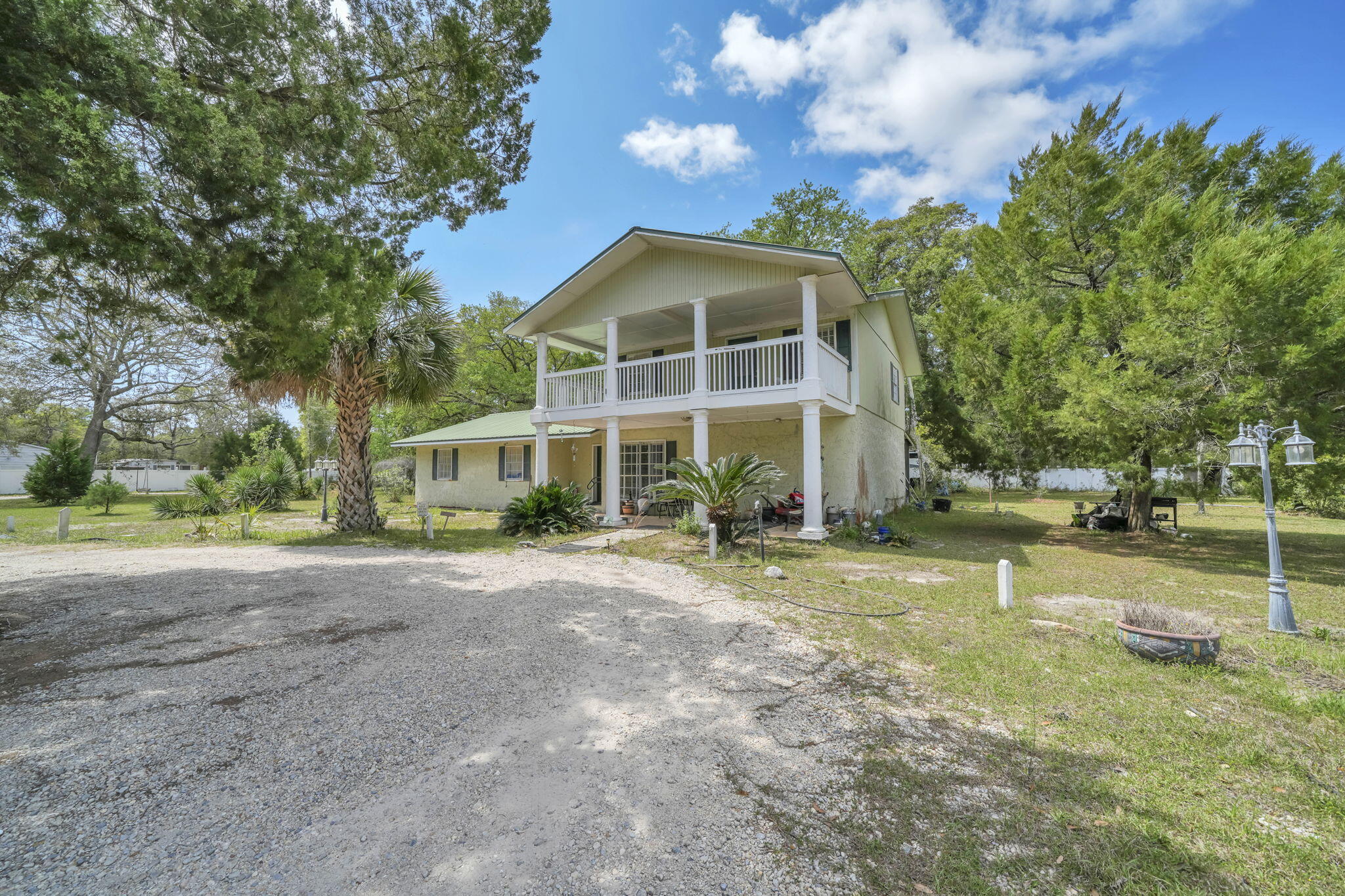 Discover a rare opportunity to own 4.63 acres in Freeport with space, privacy and versatility just minutes from town. Located at 223 Altman Road, this expansive property offers the freedom to create a lifestyle that fits your needs--whether you're looking for a private residential retreat, room for a family compound, space for recreational vehicles and equipment, or an investment with future potential.

The property features a two-story block home with 5 bedrooms and 2 baths, along with an additional mobile home, providing multiple possibilities for living, guests, extended family or other uses. The generous acreage offers plenty of room to spread out, with space for a workshop, garden, boats, RVs, outdoor recreation and more.

Enjoy the privacy and relaxed lifestyle of acreage living while remaining convenient to Freeport, Black Creek, Choctawhatchee Bay and the beaches of South Walton.

Properties offering this much usable land, flexible and proximity to both Freeport and the Emerald Coast are increasingly difficult to find. Bring your vision and discover the possibilities.