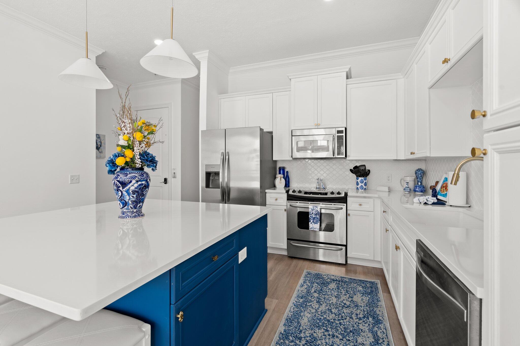 **ALREADY $115K ON THE BOOKS FOR 2026 -- AND BOOKING NICELY FOR 2027!**

Welcome to your GORGEOUS coastal beach retreat!

This elegant townhome known as **The Hampton** is just a 4-minute walk to the white sandy beaches. Perfect as an investment property, primary residence, or vacation/second home, this luxurious, fully furnished **5 bedroom, 4.5 bath** sleeps up to 14 guests in high style and cozy comfort. And its location so close to the turquoise Gulf of Mexico means you'll enjoy sea breezes, ocean views, and unforgettable sunsets -- without ever leaving your front door.

**HIGHLIGHTS INCLUDE:**
• **Already $115K on the books for 2026 & booking nicely for 2027!**
• Nautical, Hamptons-style design with elegant finishes
• Multiple private balconies with ocean breezes and sunset Gulf views
• Gourmet kitchen, fully equipped with all the essentials
• Spacious open-concept living with 10 ft ceilings
• Easy access to community pool
 ----------
LIVING SPACES:
--Gourmet Kitchen: White granite, cobalt cabinetry, farmhouse sink, bronze fixtures, and seating for four at the island.
--Dining Nook: Bench seating for five with views of palms, sunsets, and the ocean through floor-to-ceiling windows.
--Living Room: Indigo sectional, natural-linen armchair, Smart TV, and airy coastal tones create the perfect spot to relax together.
----------
BEDROOMS AND BATHS:
--Master Suite (3rd floor): King bed, private balcony with sea views, spa-like ensuite with soaking tub & custom walk-in shower.
--Guest Suites: Two Queen bedrooms, each with ensuite baths and elegant Hamptons décor.
--Family Bunk Rooms: Two bedrooms with twin bunks (4 beds each), perfect for kids or teens. Shared full bathroom with mosaic tile.
--Bathrooms: 4.5 total, all featuring white granite, cobalt blue cabinetry, and bronze fixtures.
----------
OUTDOOR FEATURES:
--Private Balconies: Doors open to multiple balconies with Gulf breezes and vibrant sunsets.
--Community Pool: Perfect for cooling off after a day at the beach.
--Private garage for parking, a fun game-room conversion, or room to store your pool toys and beach equipment.

Thank you for your interest!  

Ask your Realtor for the Airbnb link, and be sure to view the walkthrough video attached to this listing.  

We look forward to your offer!