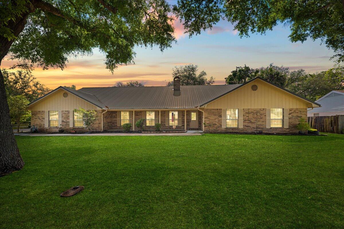 Welcome to 121 Edwards Lane in Fort Walton Beach--a standout property offering exceptional space rarely found in this highly sought after Elliot Point neighborhood. Generously sized bedrooms provide comfort and flexibility, while oversized living areas are ideal for entertaining or relaxing. The upstairs bonus room is 605 sf and would make a great game room, home theater, or extra retreat. This area can also be converted back to storage to lower overall square footage. An additional flex room offers potential for attached separate living quarters for aging parents, guests, or extended family. Step outside to a private backyard oasis with a pool, beautiful landscaping, and plenty of room to unwind. A durable metal roof and classic brick exterior add lasting value and curb appeal. A rare opportunity to own a home with this much square footage in Elliot Point.-- Don't Miss!