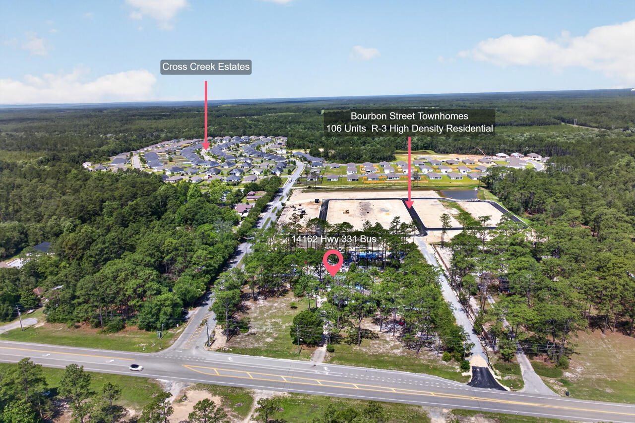 Development opportunities with this combination of acreage, zoning, frontage, and location are becoming increasingly difficult to find in the rapidly expanding City of Freeport. Positioned directly in front of the new Bourbon Street Townhouse Development Project, this 2.06-acre High Density Residential (R-3) property presents an exceptional opportunity for investors, builders, developers, and entrepreneurs seeking to capitalize on one of the area's fastest growing corridors.
Featuring approximately 302 feet of paved frontage along Business 331, this property offers both visibility and accessibility while providing substantial future development potential. Zoned High Density Residential (R-3), allowable density provides for up to eight single-family dwelling units per acre or up to fourteen duplex, triplex, quadruplex, or townhouse dwelling units per acre, creating multiple paths for future development and income-producing opportunities.
Currently situated on the property is an approximately 1,884 square foot residence offering 3 bedrooms, 2 bathrooms, existing utilities, spacious living areas, abundant natural light, and functional space that allows immediate occupancy, rental income potential, office space, or interim use while development plans take shape. The property additionally features a detached building with substantial storage area, garage space, and carport coverage while the unrestricted acreage allows flexibility rarely found within city limits. Park boats, RVs, equipment, work vehicles, or construct additional improvements without HOA restrictions.

Strategically located within Freeport city limits and less than two miles from all three Freeport schools, this central location provides convenient access throughout Walton County while remaining approximately 12 miles from the Emerald Coast beaches. Destin, Niceville, DeFuniak Springs, shopping, dining, boating, charter fishing, Crab Island, and entertainment destinations remain within easy reach.

Property highlights include:
*2.06 acres within Freeport city limits
*Approximately 302 feet of paved frontage on Business 331
*Zoned High Density Residential (R-3)
*Existing utilities already in place
*Flood Zone X
*No wetlands per Walton County GIS mapping
*Detached storage building, garage, and carport
*No HOA restrictions
*Directly adjacent to an active area of residential growth and development

Whether your objective is redevelopment, residential density opportunities, income-producing investment, land banking, business use, or long-term appreciation potential, this property offers flexibility and scale rarely available within the growing Freeport market.

Buyer to verify all information deemed important including zoning, density allowances, land use, dimensions, utilities, development potential, and future use possibilities.