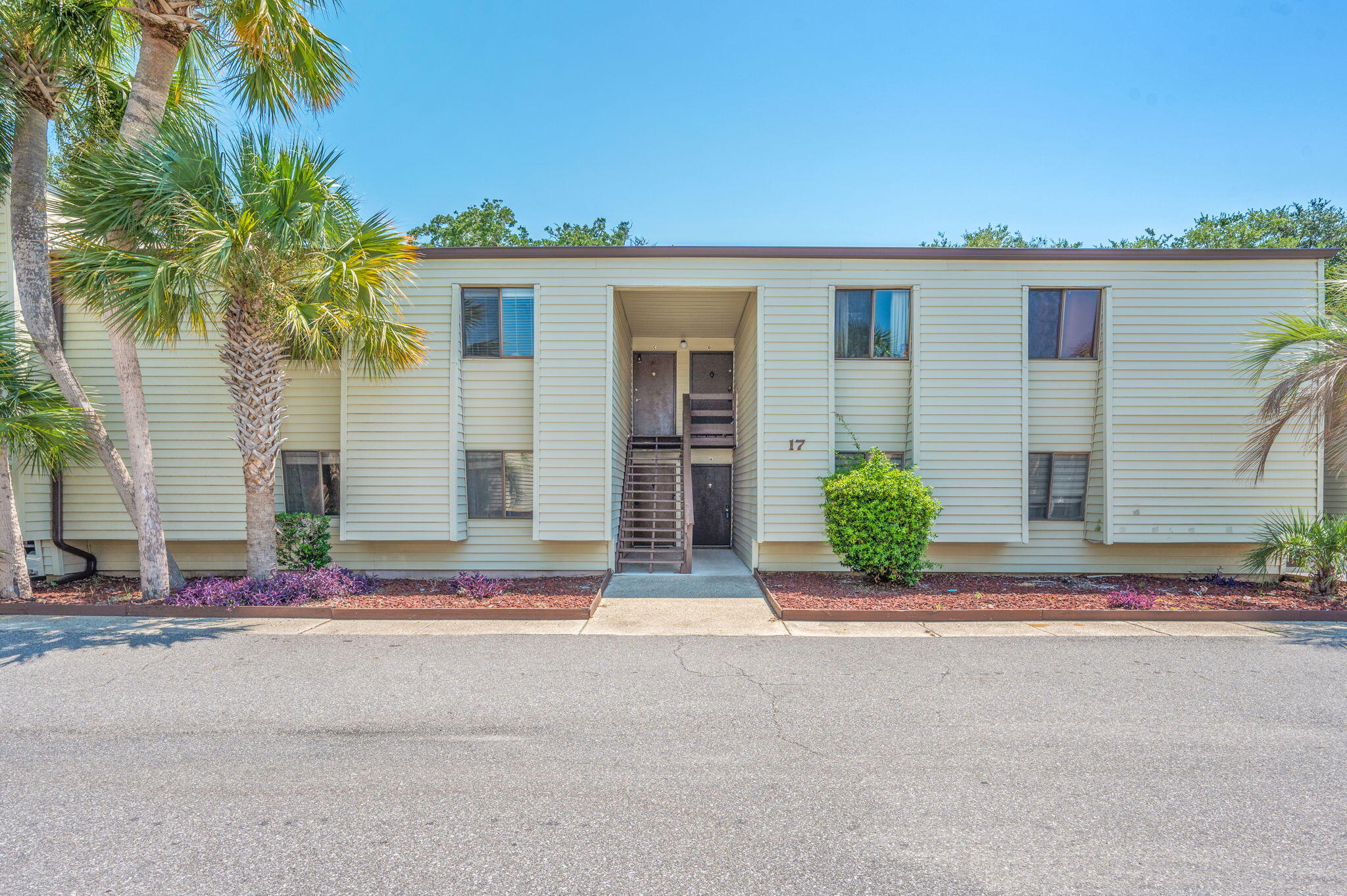 NO HOA FEES UNTIL JANUARY 2027! This well-maintained 2-bedroom, 1-bathroom second-floor condo features stylish luxury vinyl plank flooring, a new A/C installed in 2025, and updated appliances, including a new dishwasher and microwave. Enjoy an array of waterfront community amenities, including a sound-front pool, tennis court, clubhouse, fishing dock, and boat slips. HOA dues include water, sewer, and trash. Short-term rentals are not permitted, creating a peaceful and well-maintained community.