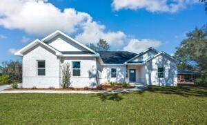 This brand new home is built on over an acre, by Local Parade of Homes winning builder. 4 bedrooms, 2 baths. Upgraded Lighting Package and Ceiling Fans in all bedrooms. Luxury Vinyl Plank throughout and NO CARPET. A gorgeous light and bright palette. Gorgeous olive green cabinets  The kitchen features an oversized island with undermount sink and quartz countertops. The Master Bathroom has double vanities, a large soaking tub and a separate shower with seat. Our garages are finished, painted walls, pull down attic stairs and automatic garage door openers. Seller will pay towards buyers closing costs. Preferred lender can close in four weeks. Home will be complete late August