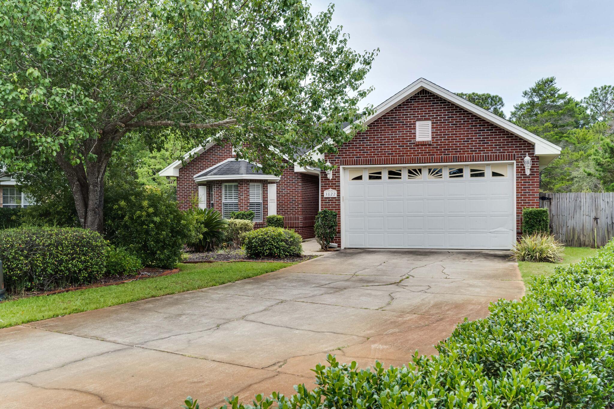 Indian Trail Estates- Beautifully maintained brick 3-bedroom, 2-bath executive home, ideally located in the heart of Destin. Tucked away with easy access to both the Mid-Bay Bridge and Destin Bridge--without having to battle Highway 98 traffic- this home offers an exceptional location for commuting, shopping, dining, military bases, and the Emerald Coast's beautiful beaches.

The spacious kitchen is the centerpiece of the home, featuring custom cabinetry, granite countertops, stainless steel appliances, tile backsplash, and a breakfast bar that opens to the living area, making it perfect for entertaining or staying connected with family and guests.

The living room flows seamlessly to a large screened porch overlooking a private, fully fenced backyard with no rear neighbors. The primary suite also offers direct access to the screened porch, creating a peaceful retreat. The ensuite bathroom includes dual vanities, a relaxing soaking tub, and a separate walk-in shower.

Features include hardwood and tile flooring throughout, an indoor laundry, and a decorative fireplace that adds charm to the living room.

Contact us today to schedule a viewing. Call 850-729-0399 View rental requirements or apply at www.RentwithBSR.com 

No smoking or vaping. pets may be allowed with some restrictions and a $400 non-refundable pet fee.

FEES: $50 per adult 18+ application fee, Landlord Liability Policy (if proof of Renter's coverage is not provided) $15 mo, Pest Assurance pest policy $20 mo.