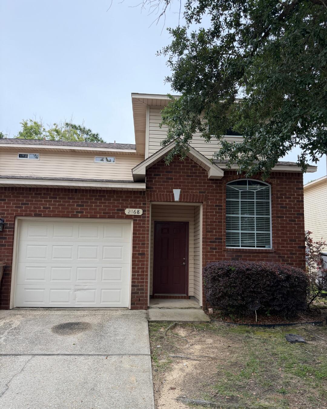 Welcome to this beautifully renovated 3-bedroom, 3-bath townhome nestled in the desirable East Navarre community -- a rare find offering modern updates, a flexible layout, and an unbeatable coastal location. Step inside and be impressed by soaring 9-foot ceilings, crown molding, recessed lighting, and brand new flooring, fresh paint, and new light fixtures throughout. The open-concept kitchen is a true showstopper, featuring a breakfast bar, stainless steel Kenmore appliances, and custom pendant lighting, perfect for everyday living and entertaining alike.

This home offers a rare and versatile layout with a first floor bedroom and a full bathroom conveniently located on the main level -- ideal for guests, in-laws, or multi-generational living. Upstairs, the spacious primary suite features two closets, a cultured marble vanity, and its own private en suite bathroom. A third bedroom and full guest bath complete the upper level.
This home is loaded with thoughtful updates and extras, including a brand new GE washer and dryer, stylish vinyl plank stair treads with built-in storage underneath, and an enlarged outdoor patio with walking path access. Major systems have been well maintained with a new roof coming in 2026, HVAC replaced in 2022, and water heater in 2018.

Located just minutes from the stunning Gulf beaches and conveniently close to military bases, top-rated schools, shopping, and dining, this move-in-ready gem is an exceptional opportunity you don't want to miss!