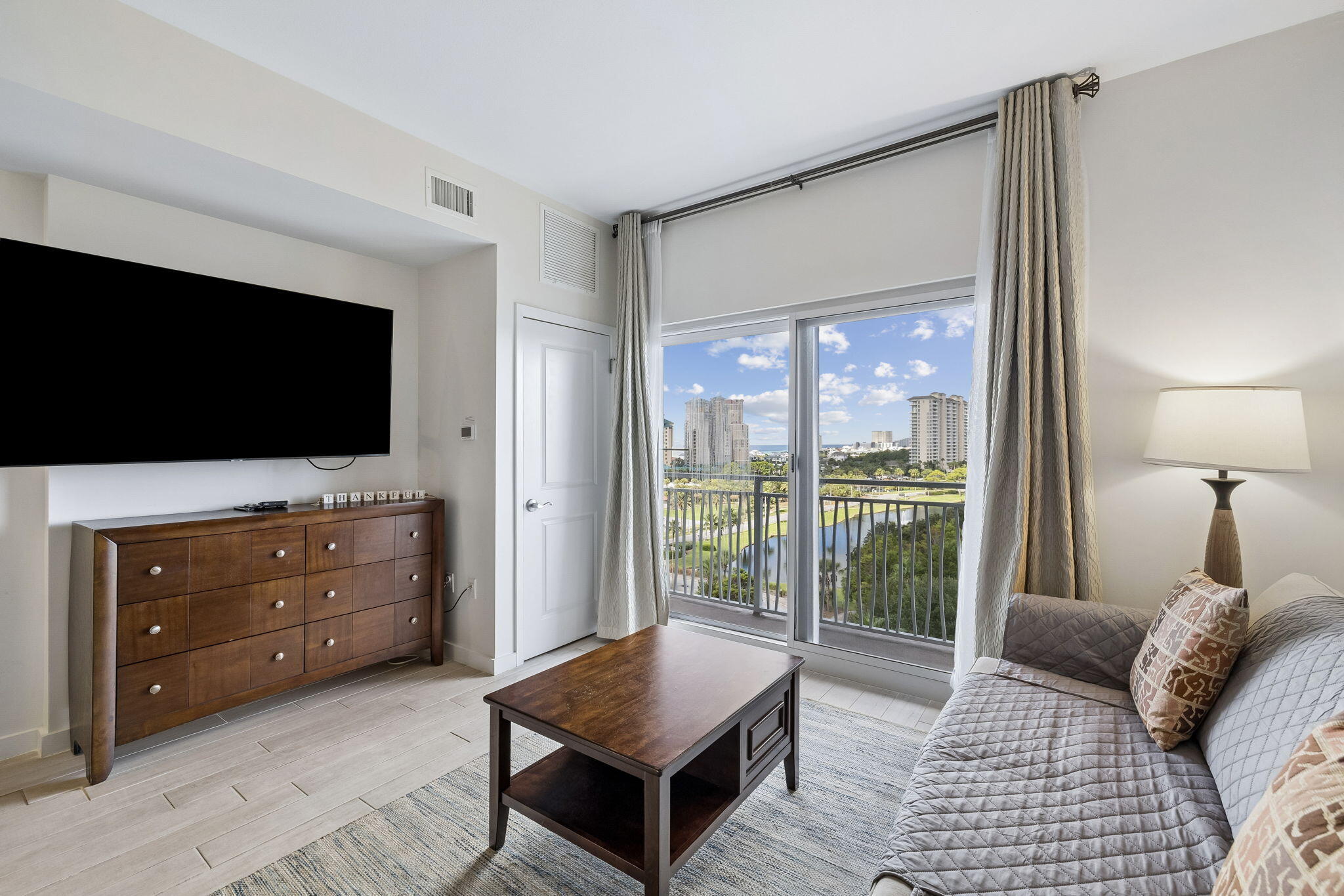 Positioned on the 7th floor on the desirable west-facing side of Luau I, this spacious studio enjoys Gulf views, a private balcony, and an elevated view across the beautifully landscaped grounds of the Sandestin Golf and Beach Resort. The open layout provides plenty of room to relax, with a king bed, sitting area, dining space, and kitchenette, while large glass doors fill the interior with natural light and frame views across the resort toward the emerald waters of the Gulf of Mexico. Luau I offers a resort experience of its own, highlighted by a tropical lagoon style pool with a swim under waterfall, hot tub, fitness center, grilling area, and rooftop observation deck with panoramic views stretching from the Gulf to Choctawhatchee Bay. Best of all, the sugar white sand and emerald waters of the Gulf are just a short walk away. Beyond Luau, Sandestin Golf and Beach Resort spans 2,400 acres from the beach to the bay and offers championship golf, tennis, a full service marina, watersports, miles of walking and biking paths, and the shopping, dining, and entertainment of The Village of Baytowne Wharf. Grand Boulevard is also just minutes away with additional restaurants, shopping, and entertainment. Whether enjoyed as a personal beach retreat, second home, or vacation rental investment, this 7th floor studio offers an easy way to experience one of the Emerald Coast's most established resort communities.