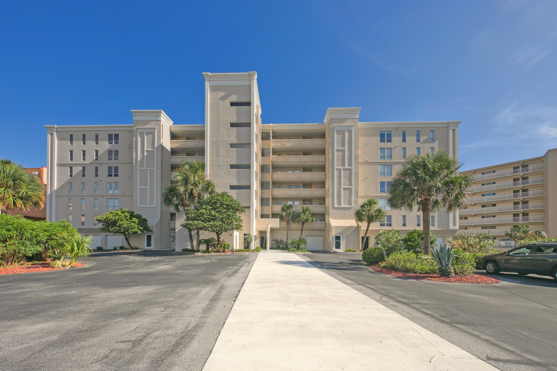 Breathtaking views from every room. Directly on the beach this condo comes with a double size patio for lounging or entertaining & steps to the beach. Private garage parking. Two gulf front bedrooms, extended living area, tile floors, large master suite, stainless steel appliances, quartz countertops, new A/C unit,& electric sun shades. The master bath has a large shower, quartz countertops and plenty of closet space/storage. The guest bathroom has been remodeled w/ subway tile and marble floors. With over 240 ft of beachfront, this low density complex has one of the least crowded beaches along the Emerald Coast. This 24 unit building is located on Holiday Isle with amenities that include: swimming pool, tennis court and security gate. Road resurfaced, pool resurfaced and tennis court resurfaced out of reserves.