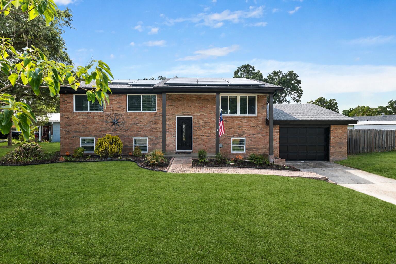 Welcome to 102 NW Robinwood Drive, a beautifully updated 5-bedroom, 2.5-bath brick home in Fort Walton Beach's established Bel Air neighborhood. Situated on a fully fenced corner lot, this move-in-ready home combines timeless character with extensive modern updates and a location that puts you just minutes from shopping, dining, schools, Eglin Air Force Base, Hurlburt Field, and the Emerald Coast's world-famous beaches.

Inside, you'll find fresh interior paint, updated lighting and fixtures, new carpet in the secondary bedrooms, and stylish new flooring in the kitchen. The thoughtfully designed kitchen features granite countertops with striking amber veining, dark cabinetry accented by a glass tile backsplash, stainless steel appliances, and a gas range, creating a functional and inviting space for everyday living and entertaining.

The spacious primary suite offers a peaceful retreat with private access to the backyard, a walk-in closet, dual vanities, and a beautifully tiled walk-in shower. Four additional bedrooms provide flexibility for family, guests, or a home office.

Step outside to enjoy the private backyard featuring an open deck, raised garden beds, a dedicated fire pit area, and plenty of room to relax or entertain. The oversized one-car garage provides additional storage and workspace.

Major improvements provide peace of mind, including a new roof (2020), energy-efficient windows (2019), HVAC system (2019), and water heater (2018) updated electric (2021).