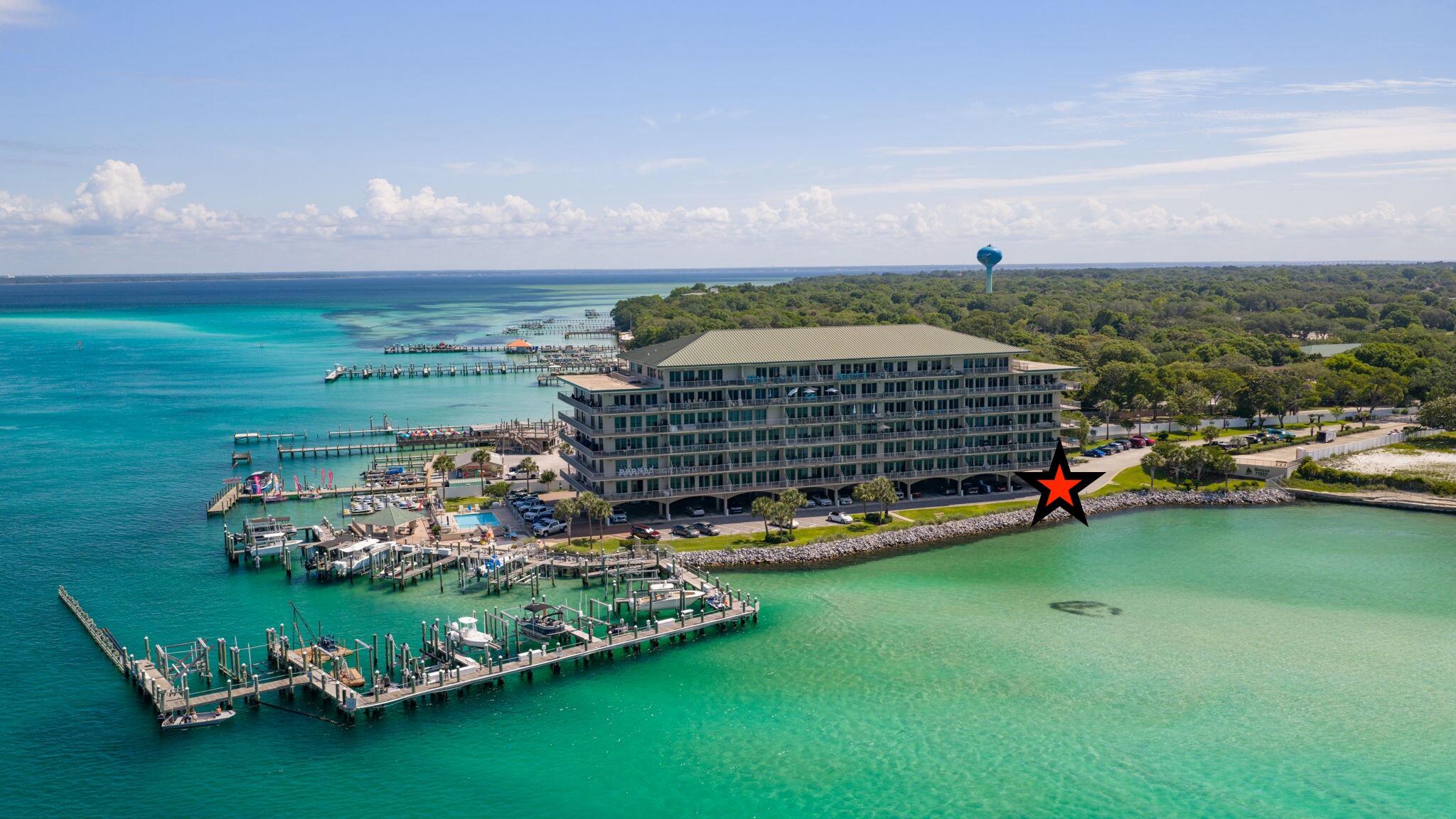 Welcome to 'Fort Destin', where you'll find a unique waterfront condominium with a breathtaking million-dollar view. This gem is often overlooked due to its prime location, offering panoramic vistas of the Gulf, East Pass, Crab Island, and Destin Harbor. Rest assured, this well-built construction has passed all SIRS inspections in 2025, ensuring your safety and peace of mind.
Nestled in the easterly corner, this unit boasts a wrap-around balcony spanning over 1000 square feet. Each bedroom features its own balcony door, providing stunning views and a refreshing breeze from the Gulf. Floor-to-ceiling glass windows with a 140 MPH impact rating enhance the ambiance, while the interior is adorned with tile flooring, custom cabinetry, a wine refrigerator, a double oven, ceiling fans, recent paint, roller shades, 10-foot ceilings, stainless steel appliances, a ceiling tray/coffered design, and a pantry.
The meticulously maintained interior exudes a sense of newness, thanks to an abundance of natural light that floods every room. Imagine waking up to the beauty of the waterfront and enjoying a luxurious coastal retreat every day.
The owners of this condominium are highly active and passionate about adventure. They often kayak to the Destin Harbor to explore its many wonderful restaurants. On their way, they relish the sights of Crab Island and their favorite ''private beach.''
This home is perfect for the active couple who craves adventure and seeks a luxurious coastal escape