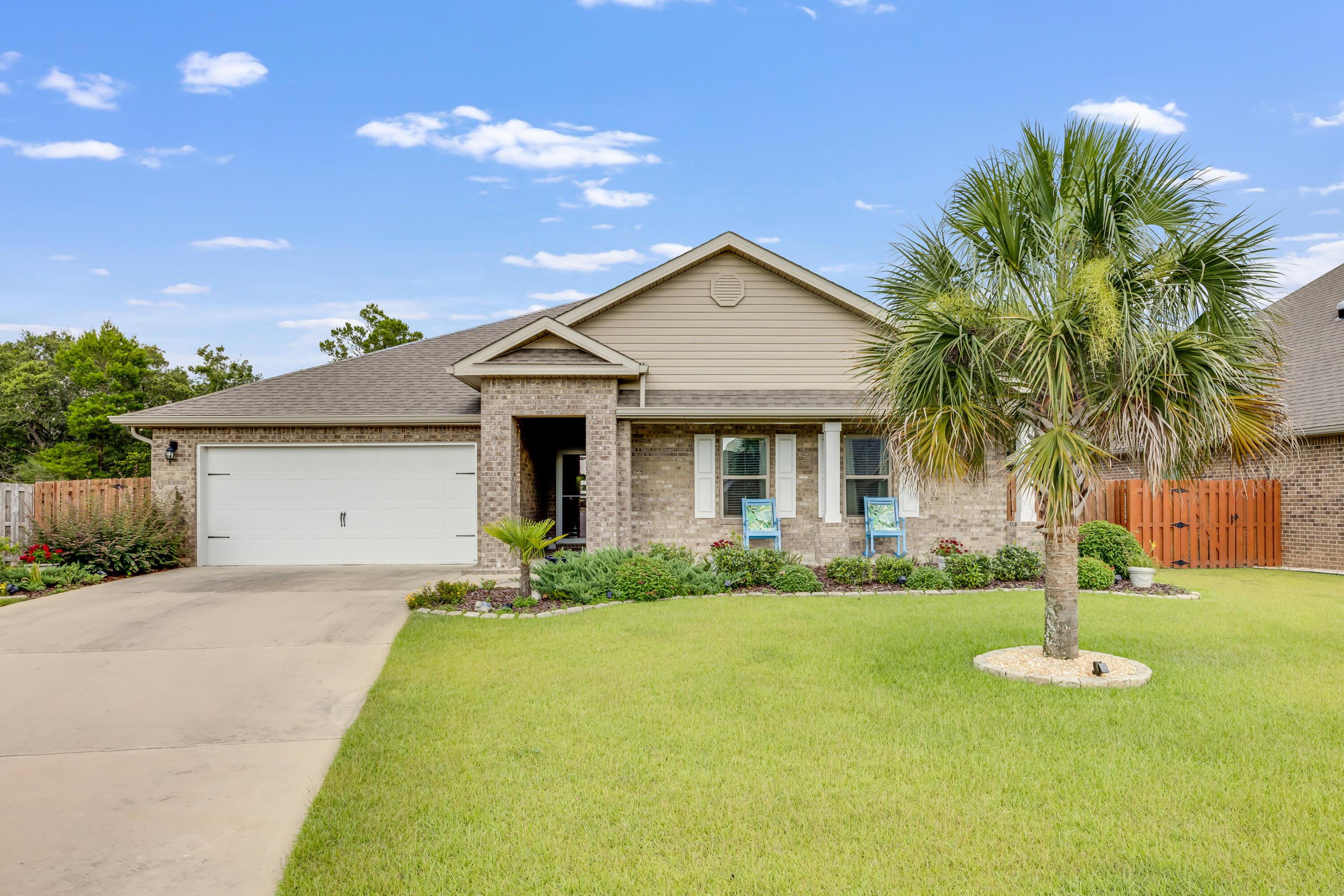 Quick walk to elementary and middle school! 
Numerous seller upgrades! 
Beautiful 4BR/2BA, 2,347 sqft home in a sought-after neighborhood just north of I-10 with a community pool. The spacious kitchen features a large island, stainless steel appliances, and a refrigerator with icemaker. LVP flooring runs through the main living areas, and the home offers 8 closets, kitchen pantry and attic storage over the garage for ample storage. Enjoy the screened-in porch with fan, lush landscaping with stone-edged flower beds, a front palm tree, and wooded views in the back. Includes large-capacity washer & dryer, irrigation system, underground drainage, and a garage with sleek Ninja floor coating.