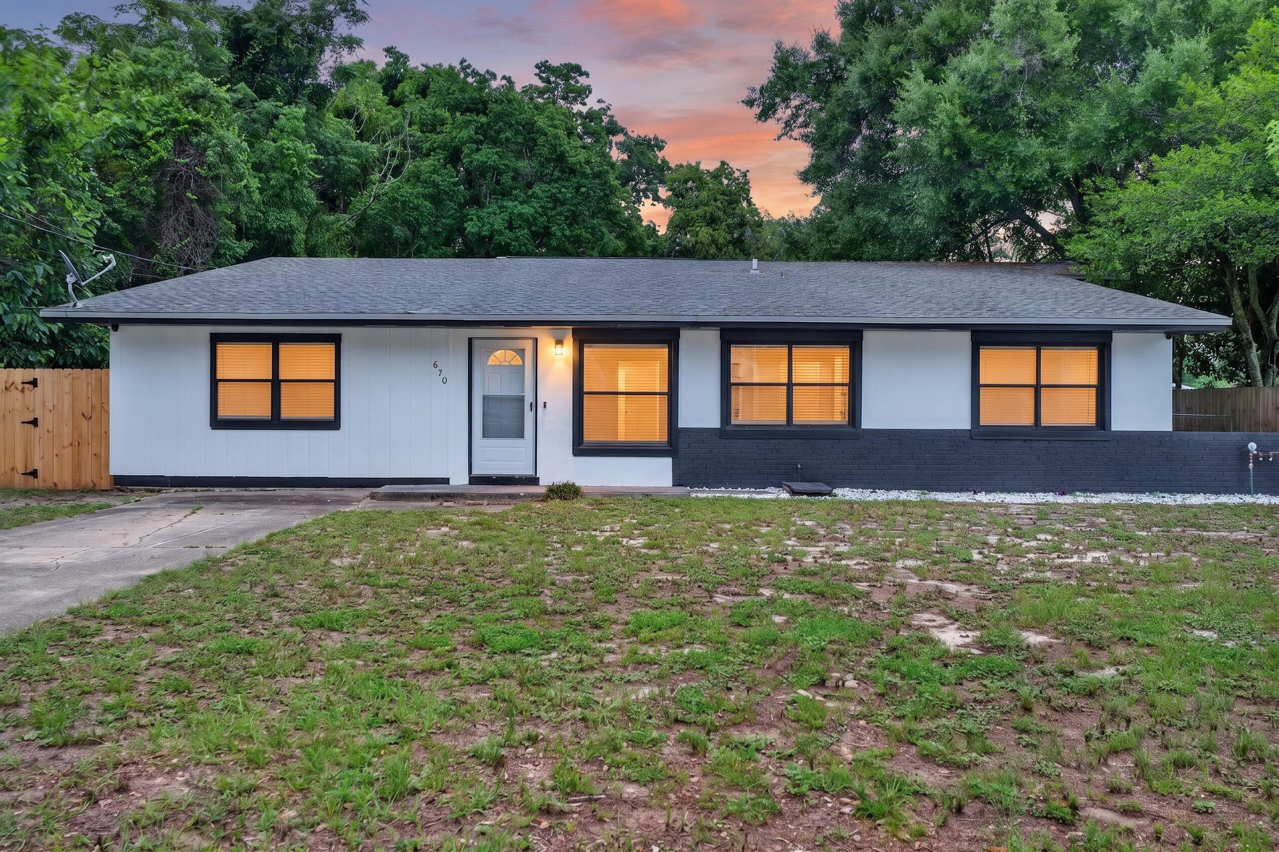 Centrally located in the heart of Fort Walton Beach, this beautifully updated 4-bedroom home offers the perfect blend of style, comfort, and convenience. Just minutes from both Eglin and Hurlburt Field Air Force Bases, this move-in ready property features all new luxury vinyl plank flooring throughout and fully updated bathrooms showcasing sleek flat white tile with striking black tile accents, plus a modern heated mirror for a touch of luxury. The renovated kitchen is designed to impress with hardwood soft-close cabinet doors, elegant quartz countertops, and all new stainless steel appliances. Fresh exterior paint adds to the home's curb appeal, while the massive primary suite provides a true retreat with a full-size walk-in closet and private en suite bathroom. With spacious living areas, high-end upgrades, and an unbeatable central location, this home is ready for its next owner to enjoy