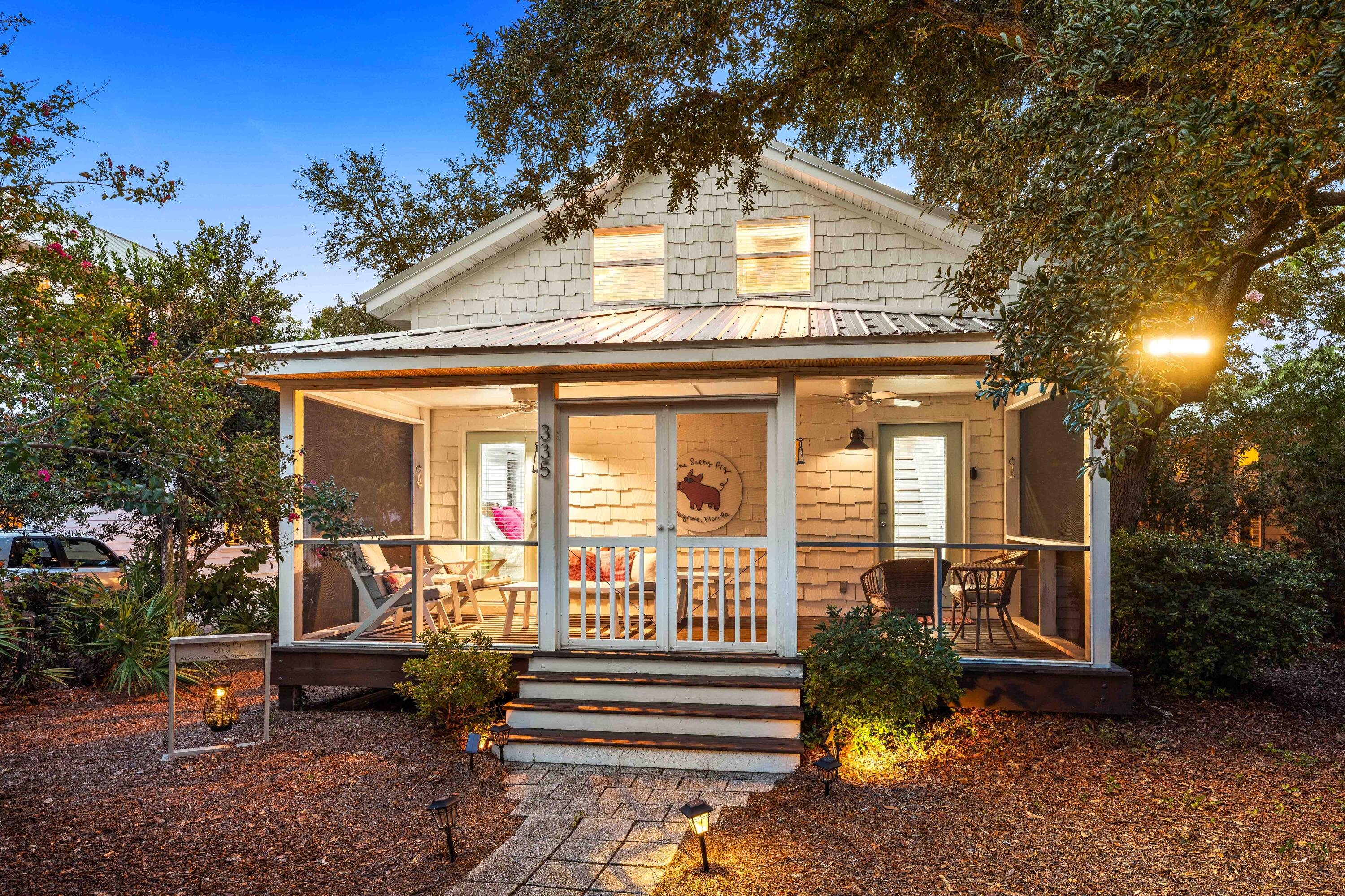 Experience the understated luxury of Seagrove Beach at 335 San Juan Avenue, a beautifully updated 3-bedroom, 3-bath coastal cottage offering approximately 1,725 square feet in Gulf Shore Manor. Blending timeless Old Florida character with refined coastal comfort, this two-story retreat is offered as a turnkey property ready for immediate vacation rentals. Its welcoming screened porch, private yard with a spacious deck and grilling area, and versatile layout also make it well suited as a primary residence or second home.

Bright, thoughtfully designed interiors create an inviting atmosphere for relaxed living and effortless entertaining. The main level includes a comfortable bedroom suite, while the second floor offers a generous primary suite and an additional bedroom with a private bath. A new HVAC system provides year-round comfort, while the metal roof, installed in 2023, adds lasting value and peace of mind. Four driveway spaces provide convenient off-street parking.

An exceptional benefit of ownership is access to six deeded beach-access locations serving Gulf Shore Manor, providing multiple connections to the white sand and waters of the Gulf of America. These recorded, nonexclusive easement rights create a distinctive opportunity to enjoy the shoreline from several points throughout the community. Nearby regional public beach accesses provide additional conveniences, including parking, restrooms, and accessible boardwalks. From quiet mornings beside the Gulf of America to sunset bike rides along the Scenic Highway 30A multi-use path, the celebrated Seagrove lifestyle is always within easy reach.

Nearby coastal cafés, acclaimed restaurants, specialty markets, charming boutiques, and vibrant community destinations provide an exceptional collection of dining, shopping, and entertainment experiences. With its coveted Seagrove Beach setting, inviting indoor and outdoor spaces, six deeded beach-access locations, and turnkey rental readiness, 335 San Juan Avenue captures the elevated yet unhurried lifestyle that makes Florida's Scenic Highway 30A so desirable.