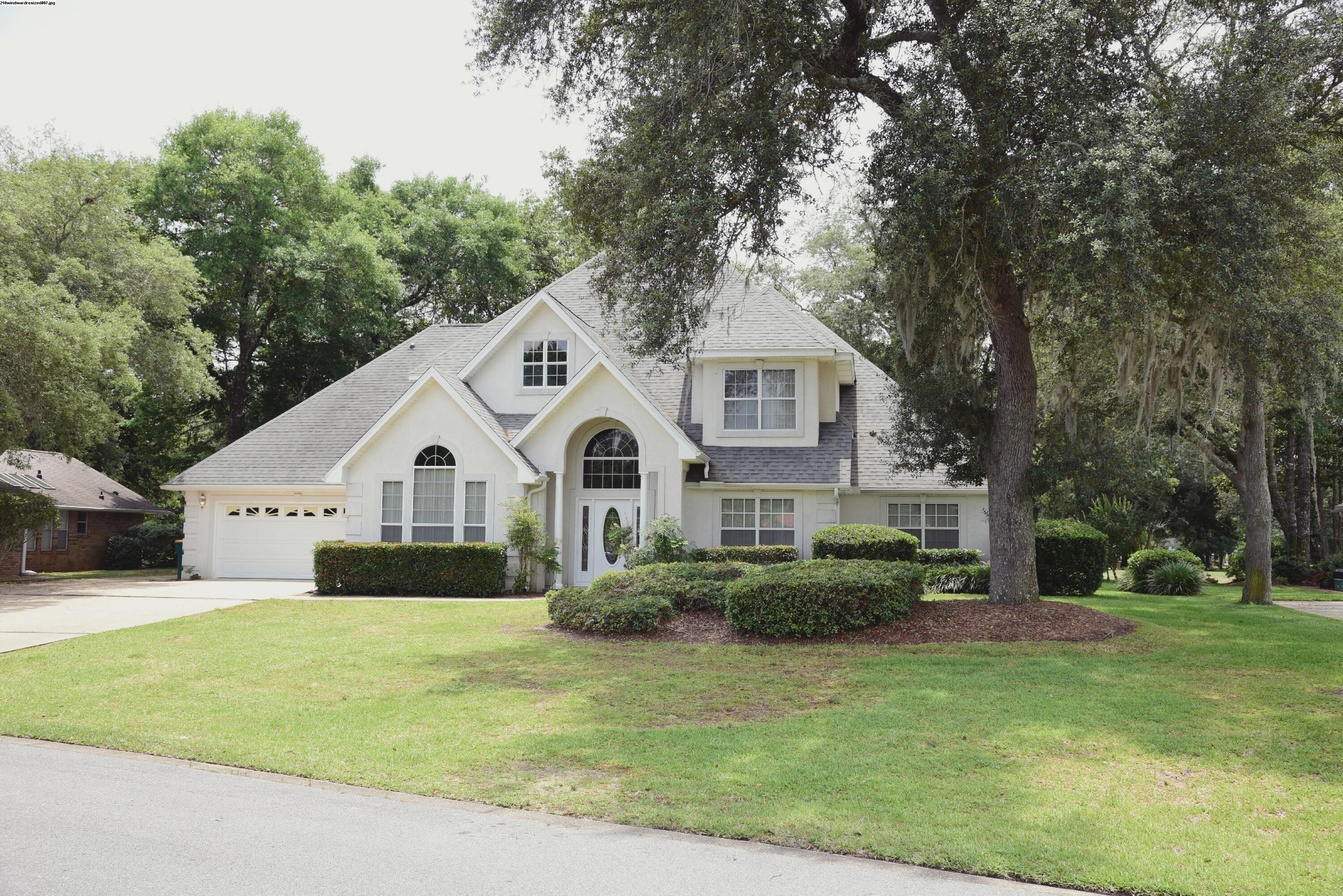 Welcome to this spacious executive home located in the gated community of Windward, where tranquil lake views create a beautiful first impression. Designed with both elegance and functionality in mind, this home offers an open floor plan, generous living spaces, and lawn service included for easy, low-maintenance living.

Step inside to find tile flooring throughout the main level and a thoughtfully designed layout. Just off the foyer, you'll find a private office or den, along with formal living and dining rooms. The impressive family room features soaring two-story ceilings, custom built-in bookcases, a cozy gas fireplace, and French doors that lead to the open patio--perfect for relaxing or entertaining.

The kitchen includes ample cabinet and counter space, tiled flooring, and a bright breakfast area for casual dining. A conveniently located laundry room and half bathroom complete the main level. The spacious primary suite is located on the first floor, offering privacy and comfort. The en-suite bathroom features double vanities, a soaking tub, separate shower, and a large walk-in closet. Upstairs, you'll find two additional bedrooms that share a full bathroom, providing plenty of space for family or guests.

Conveniently located near shopping, dining, top-rated schools, and military bases, this exceptional home offers the perfect combination of space, style, and a peaceful gated community setting. Contact us today for a showing!