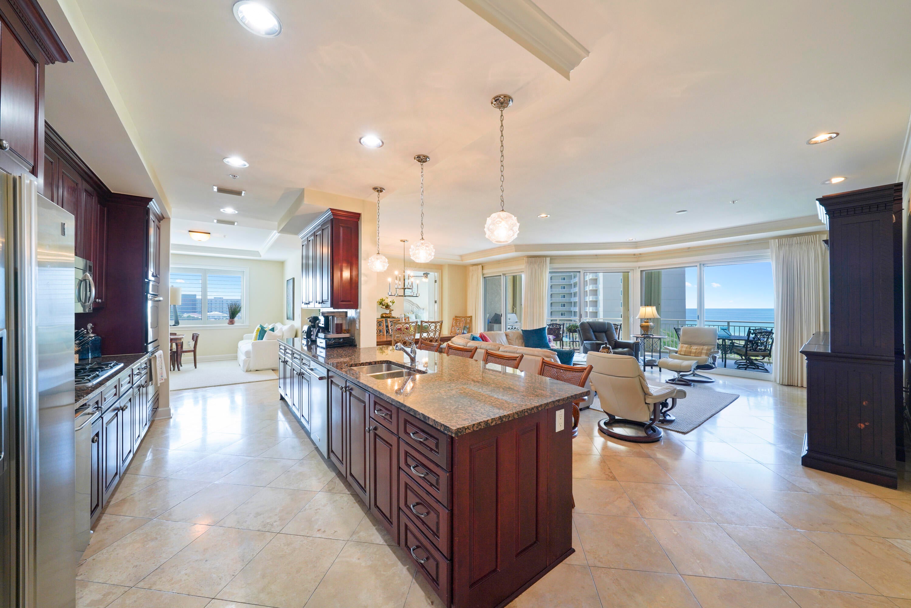 Experience the ultimate beachfront lifestyle in this exquisite, rental restricted 4 bedroom, 4 bathroom Villa in the heart of Miramar Beach. Offering 3,030 square feet of living space, this beautifully maintained and inviting Villa features breathtaking Gulf views and exceptional comfort. Located on the 3rd floor of Grand Dunes II, the Villa enjoys the equivalent of a 5th floor elevation, providing fantastic views, and it is being sold furnished. It is also the largest Villa floor plan in Grand Dunes II. As you enter the Villa, you are welcomed by a spacious, open concept living area designed for both relaxation and entertaining. Floor to ceiling glass fills the living space with abundant natural light while showcasing panoramic views of the emerald green Gulf waters and the white sandy beaches. Travertine flooring extends throughout the private foyer, living areas, kitchen, dining room, hallways, and baths, adding warmth, elegance, and a refined coastal feel throughout the home.

The gourmet kitchen is beautifully appointed with high end stainless steel appliances, a 5-burner natural gas cooktop, soft close drawers, granite countertops and bar seating, and custom painted cabinetry. Additional features include 9.5 foot ceilings, peaceful interiors, solid wood interior doors, and oversized glass designed to maximize the stunning Gulf views.

The primary suite offers a spacious and serene retreat with dual walk in closets, tray and coffered ceilings, and a sitting area. The primary bath is equally impressive with dual granite vanities and soft close drawers, a separate dual head shower, a jetted soaking tub with travertine surround, and a separate water closet. 

Step onto the expansive Gulf front balcony and take in the breathtaking views of the water. With over 350 square feet of outdoor space, an 11 foot depth, a built in natural gas grill, and hurricane shutters, the balcony provides an exceptional setting to enjoy sunrise mornings and relaxing sunset evenings over the Gulf.

Grand Dunes offers: "Super Quiet Interiors", 24 hour security, gated entry, lush landscaping, 3 levels of gated underground parking for owners, grand lobby, semi-private elevators leading into your private foyer, private heated pool & hot tub, Owner's Lounge with Gulf front Fitness Room, Overflow suites for guests, 200' of deeded beach, serene streams, majestic waterfall and a Lagoon Style Gulf front pool area with Hot Tub shared by both buildings and Beach Service.

Grand Dunes is the Emerald Coast's Most Desired Rental Restricted Beachfront Development!

Call us today to schedule your private viewing of this gorgeous Villa!