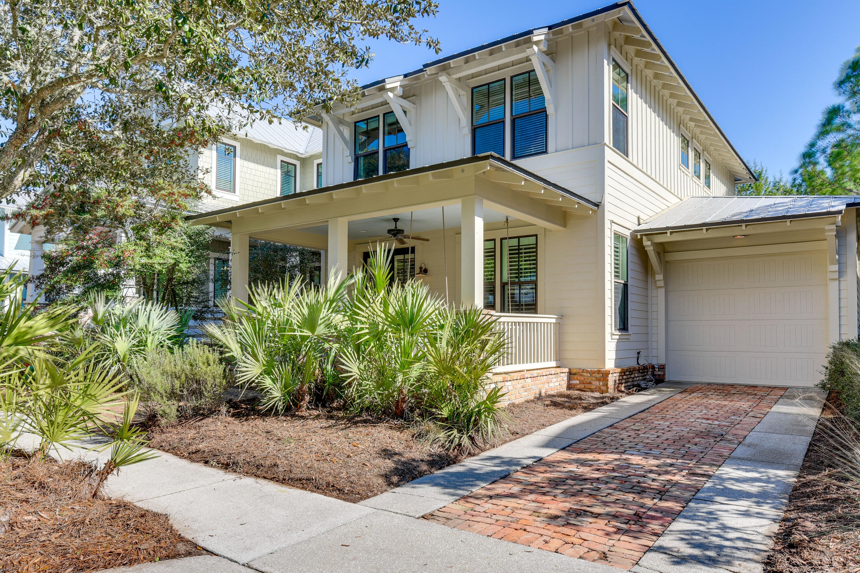 Set within the gated community of Forest Lakes, this four-bedroom, three-and-a-half-bath Florida Craftsman pairs timeless character with an inviting, functional layout. Heart pine flooring and plantation shutters add warmth throughout, while the open living, dining and kitchen areas create an effortless setting for everyday living and entertaining. The main level features the primary suite, a dedicated office, laundry room and half bath. Step outside to a private screened porch or relax on the front porch, clad in old Chicago brick, complete with a classic porch swing. A one-car garage provides additional convenience. A second loft-style living space is available on the second floor so guests may spread out. This is a highly accommodating floor plan for primary residents or second home/investment owners.

The community's masterplan was designed by the late award-winning architect Cary McWhorter. Forest Lakes is one of West 30A's most picturesque communities--where parks, lakes and natural spaces are the rule. Amenities include a two-tiered pool with waterfalls, a poolhouse pavilion with summer kitchen and fireplace, a stocked 1.9-acre lake, boardwalks, gazebo, playground, basketball hoop, green space and lakeside walking trails. The community backs to Point Washington State Forest, offering access to more than 14 miles of trails, while the white sand beaches and emerald waters of the Gulf are just moments away. All measurements and information deemed reliable should be verified by Buyer.