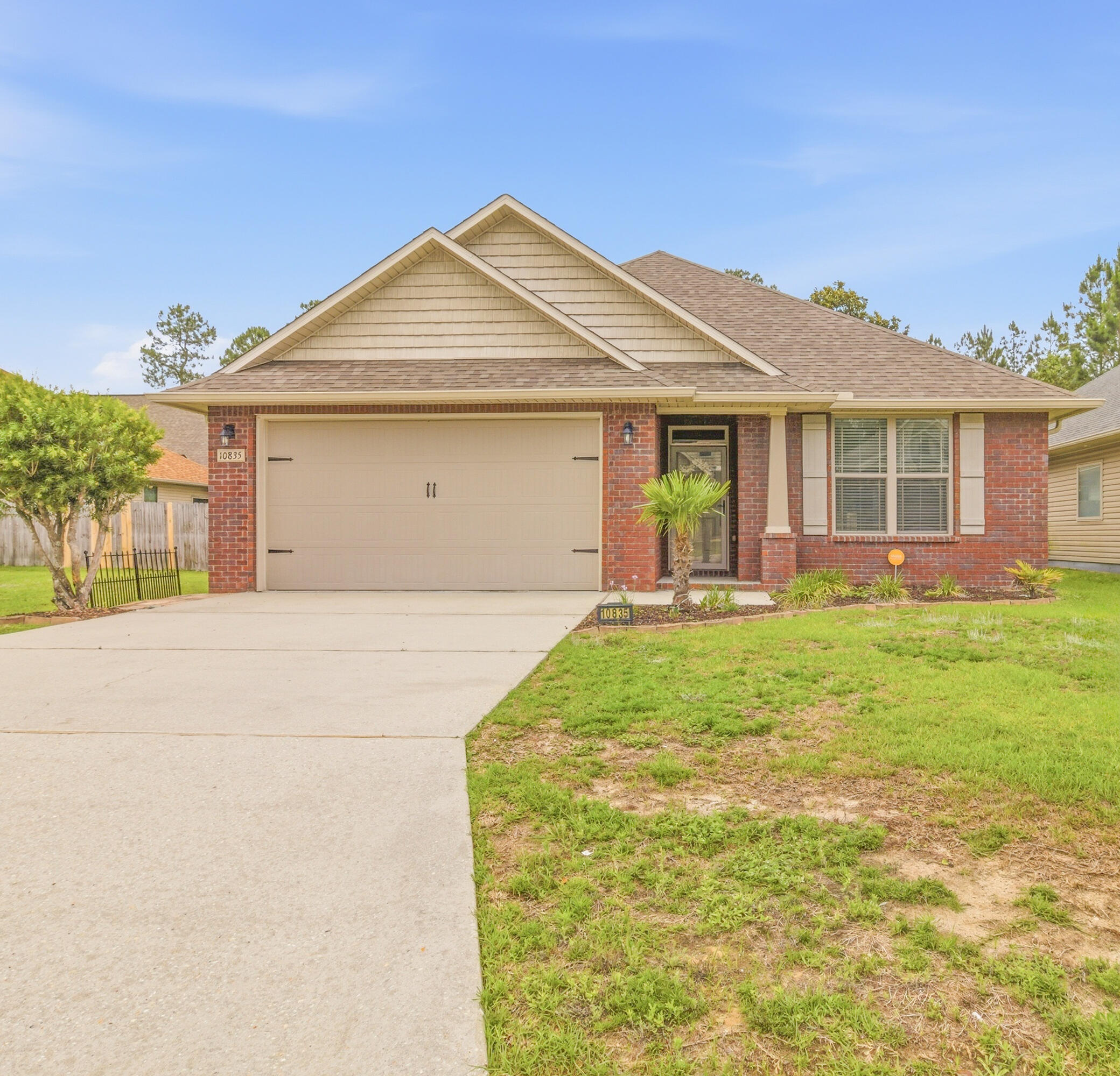 Imagine coming home to a place where comfort, convenience, and pride of ownership come together perfectly. Built in 2017 and lovingly maintained, this beautiful 3-bedroom, 2-bath home is tucked away in a welcoming neighborhood just minutes from NAS Pensacola shopping, dining, and local amenities, making everyday life a little easier. With no HOA, you'll enjoy the freedom to truly make this home your own. The bright, open living spaces are ideal for gathering with family and friends, while the kitchen features stainless steel appliances, including a GE Smart 4-Door French Door Refrigerator with fingerprint-resistant stainless-steel finish (less than 4 years old). Step outside to a spacious backyard made for backyard barbecues, playtime, or quiet evenings under the stars, complete with a storage shed less than 3 years old. Move in ready and filled with warmth, this is more than a house, it's a place to create lasting memories.
