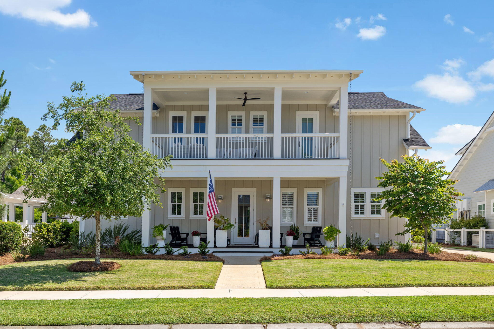 This home sits on one of the most desirable streets in Origins. Over 1,000 sq. ft. of covered outdoor living area that backs to a beautiful pond and pine trees for ultimate privacy. This home features 10 ft. ceilings, hardwood floors throughout, open floor plan, professional grade stainless steel appliances and much more. On the first floor you'll find the owner's suite overlooking the pool, a screened in patio, plus a gorgeous large pavilion with fireplace. Master bath is equipped with dual vanity, garden tub, a separate shower and an expansive custom closet. Three upstairs bedrooms all have their own on-suite bath. The home has a complete home automation system; equipped with speakers throughout, cameras, and temperature control. The two car garage also has heat and air.