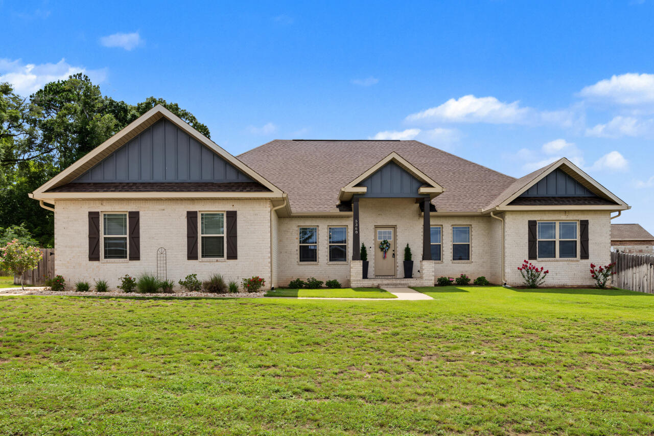 **Like-New Craftsman Home with In-Ground Gunite Pool on a Full Acre!**

This stunning 5-bedroom, 4-bathroom home feels like brand-new construction and is perfectly designed for large families or frequent guests. With en-suite bathrooms in the master suite and two additional bedrooms, everyone enjoys exceptional privacy and convenience.

Step inside to an open-concept layout where the gourmet kitchen takes center stage. Featuring expansive, gleaming granite countertops and beautiful custom cabinetry, this kitchen is built for both serious cooking and effortless entertaining. It flows seamlessly into the spacious living and dining areas, anchored by a dramatic stacked-stone fireplace that creates a warm, inviting focal point.

Wood-look tile flooring runs throughout the main living areas for easy maintenance and a modern feel, while the bedrooms offer plush carpet underfoot. A bright bonus room with abundant natural light provides flexible space--perfect for a home office, playroom, media room, or whatever your family needs.

**Outdoor Living at Its Finest**  
Relax and soak up the Florida sunshine in your private resort-style backyard. The highlight is the high-end Gunite in-ground pool, complete with soothing bubblers, a tanning ledge, umbrellas, and in-water  loungers--all meticulously maintained and ready for immediate enjoyment. A large covered patio with tropical-style ceiling fans offers the perfect shaded spot for entertaining, while the fully fenced backyard provides plenty of room for kids, pets, and play. Best of all, an **included adjacent lot** next to the fenced area gives you even more space for boats, RVs, toys, or future expansion.  

Nestled on a quiet cul-de-sac with **no HOA**, this home offers privacy, space, and freedom in a relaxing setting on nearly one full acre.

Priced to sell quickly and easy to show--don't miss this rare opportunity! Schedule your private tour today and make this dream home yours.