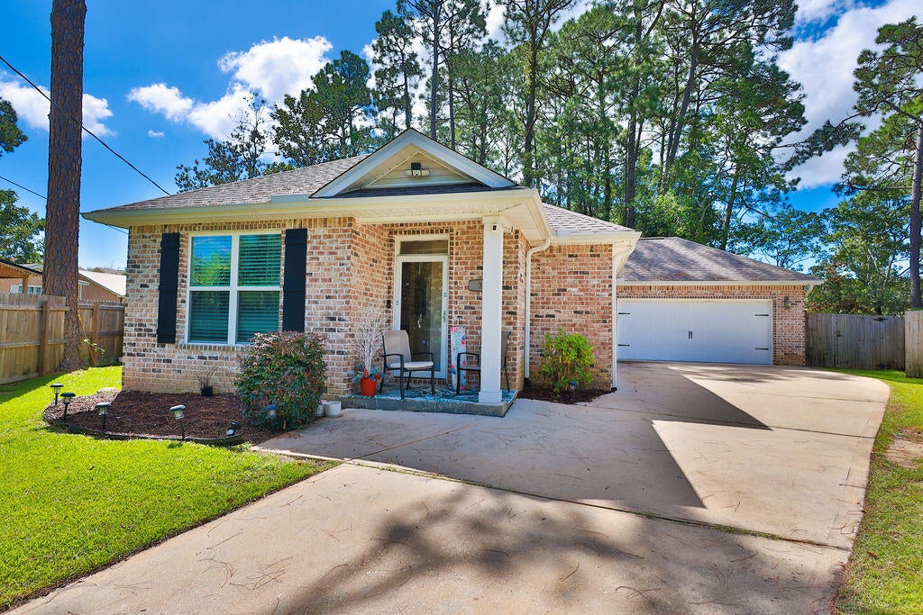 Welcome to this newer contemporary home, conveniently located near area Air Force bases and the white sand beaches of the Emerald Coast. The spacious living room opens to a kitchen with granite countertops and attractive cabinetry, while a separate dining room offers space to gather and entertain. The primary bedroom features a walk-in closet, and two additional bedrooms provide flexible space. Step outside to the lanai for outdoor dining or a relaxing evening at home. Schedule your showing today! Buyer to verify all information deemed important.