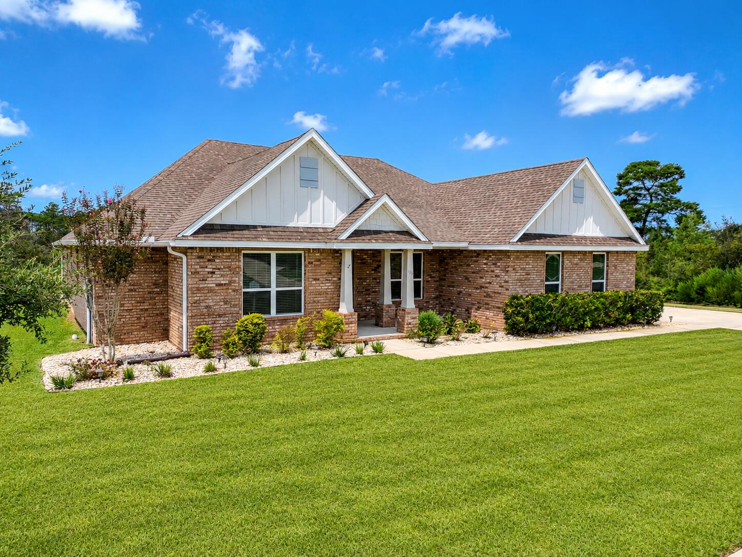 Welcome to 503 Tournament Lane, a move-in-ready 4-bedroom, 3-bath home situated on an expansive .75-acre lot in the gated community of Windswept Estates. The open floor plan is filled with natural light and features extended living spaces designed to maximize both comfort and functionality. The spacious kitchen features quartz countertops, new tile backsplash, ample cabinetry, and a butler's pantry complete with additional cabinets and quartz countertops. An extended sunroom off the kitchen provides valuable additional living space, while the primary suite features an extended owner's retreat perfect for a private sitting area. A dedicated office/study and formal dining room add even more flexibility. Additional upgrades include LVP flooring throughout the main living areas, upgraded light fixtures, and durable Ninja flooring in the garage. Outside, the .75-acre homesite has been enhanced with the entire backyard cleared, sodded, and irrigated, creating a beautiful outdoor space with plenty of room to entertain, play, or add a future pool. Thoughtfully upgraded inside and out, this home is truly move-in ready. Windswept Estates offers spacious homesites, low HOA dues, and fantastic amenities including a clubhouse, community pool, playground, tennis and pickleball courts, pavilion, food trucks, and neighborhood holiday gatherings--all surrounded by the beautiful 18-hole championship Windswept Dunes Golf Course.