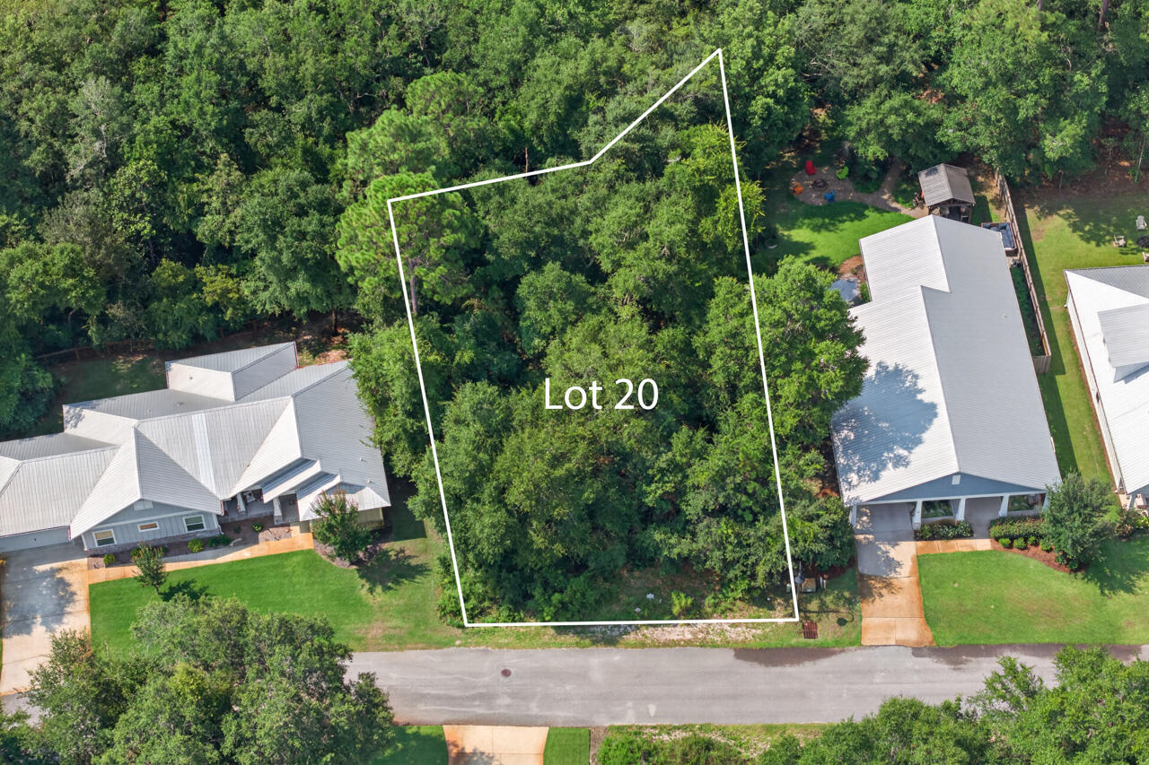 Build the home you've always envisioned on this beautiful 0.25-acre homesite in Bear Creek, one of Freeport's premier gated communities. Ideally positioned close to the community amenities, this lot offers the perfect blend of convenience, privacy, and the relaxed Emerald Coast lifestyle.

Bear Creek is thoughtfully designed for active living and everyday enjoyment, featuring a resort-style swimming pool, fitness center, tennis and pickleball courts, basketball court, playground, and inviting community gathering spaces. Spend mornings enjoying the peaceful natural surroundings, afternoons exploring the water, and evenings unwinding in this welcoming neighborhood.

Located just minutes from the public boat launch at the Highway 331 Bridge, you'll have easy access to Choctawhatchee Bay for boating, fishing, and paddleboarding. When you're ready for a day at the beach, the world-famous sugar-white sands, coastal dining, boutique shopping, and entertainment along Scenic Highway 30A are approximately 15 minutes away.

Whether you're ready to build your forever home or a relaxing coastal retreat, this homesite offers an exceptional opportunity to enjoy everything Northwest Florida has to offer.

Owner financing available-call for details.  Financing will be at a higher purchase price. 
Current listing price is for cash only.