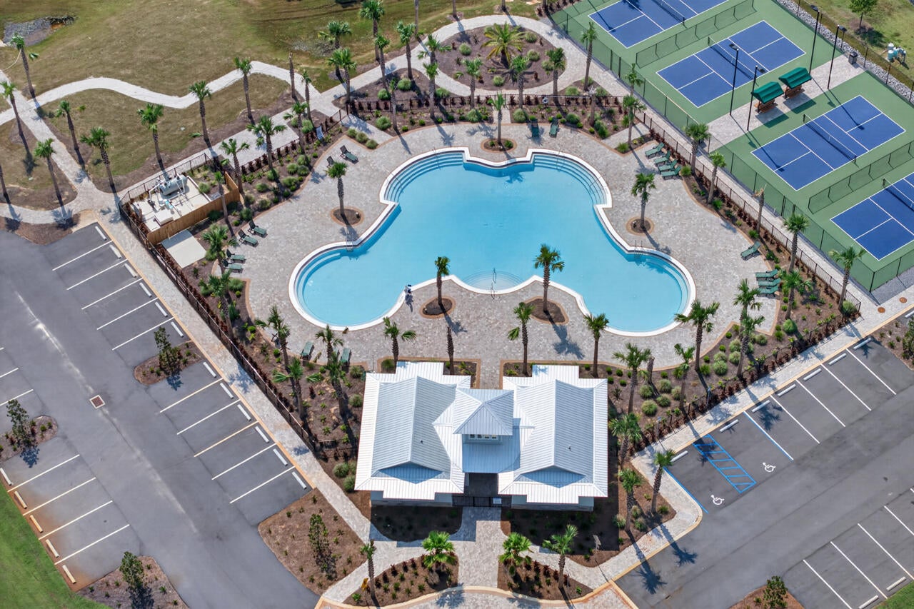 Build the home you've always envisioned on this beautiful 0.25-acre homesite in Bear Creek, one of Freeport's premier gated communities. Ideally positioned close to the community amenities, this lot offers the perfect blend of convenience, privacy, and the relaxed Emerald Coast lifestyle.

Bear Creek is thoughtfully designed for active living and everyday enjoyment, featuring a resort-style swimming pool, fitness center, tennis and pickleball courts, basketball court, playground, and inviting community gathering spaces. Spend mornings enjoying the peaceful natural surroundings, afternoons exploring the water, and evenings unwinding in this welcoming neighborhood.

Located just minutes from the public boat launch at the Highway 331 Bridge, you'll have easy access to Choctawhatchee Bay for boating, fishing, and paddleboarding. When you're ready for a day at the beach, the world-famous sugar-white sands, coastal dining, boutique shopping, and entertainment along Scenic Highway 30A are approximately 15 minutes away.

Whether you're ready to build your forever home or a relaxing coastal retreat, this homesite offers an exceptional opportunity to enjoy everything Northwest Florida has to offer.

Owner financing available-call for details.