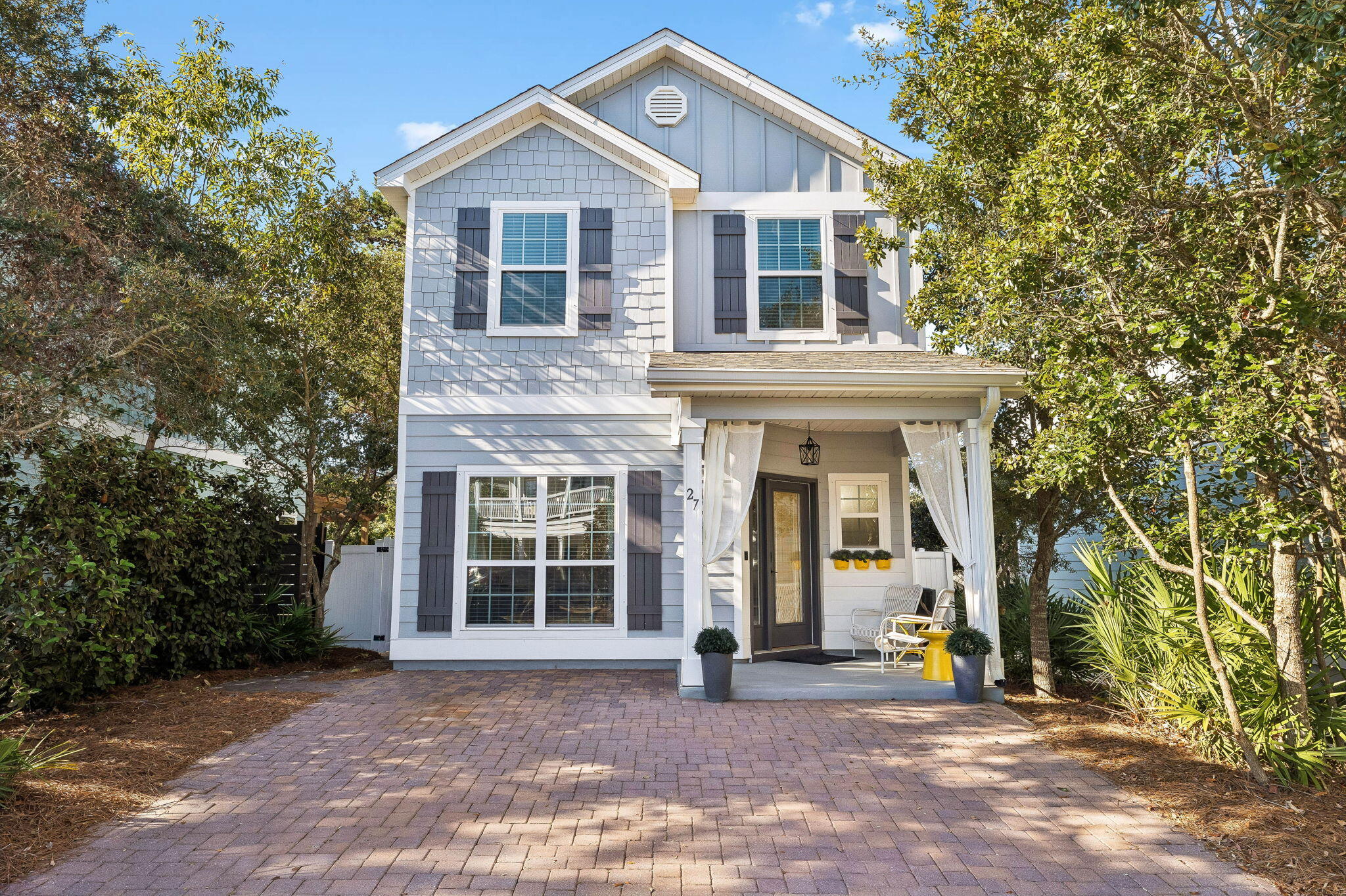 Thoughtfully designed and impeccably maintained, 27 Grayling Way presents a turnkey opportunity in Inlet Beach, equally suited as a second home or an established short-term rental. The main level is bright and open, with a seamless living and kitchen area, an office nook, powder room, laundry, and a generous owner's closet for secure storage. Upstairs, the primary suite offers a private bath, joined by a guest bedroom, bunk space, and a second full bath, creating flexible accommodations for family and guests. A strong rental history is available upon request, and investors may find added value through cost segregation strategies  A well-located, income-producing retreat at the east end of 30A, a few blocks east of the Tunnel underpass which connects to the 30A bike path.