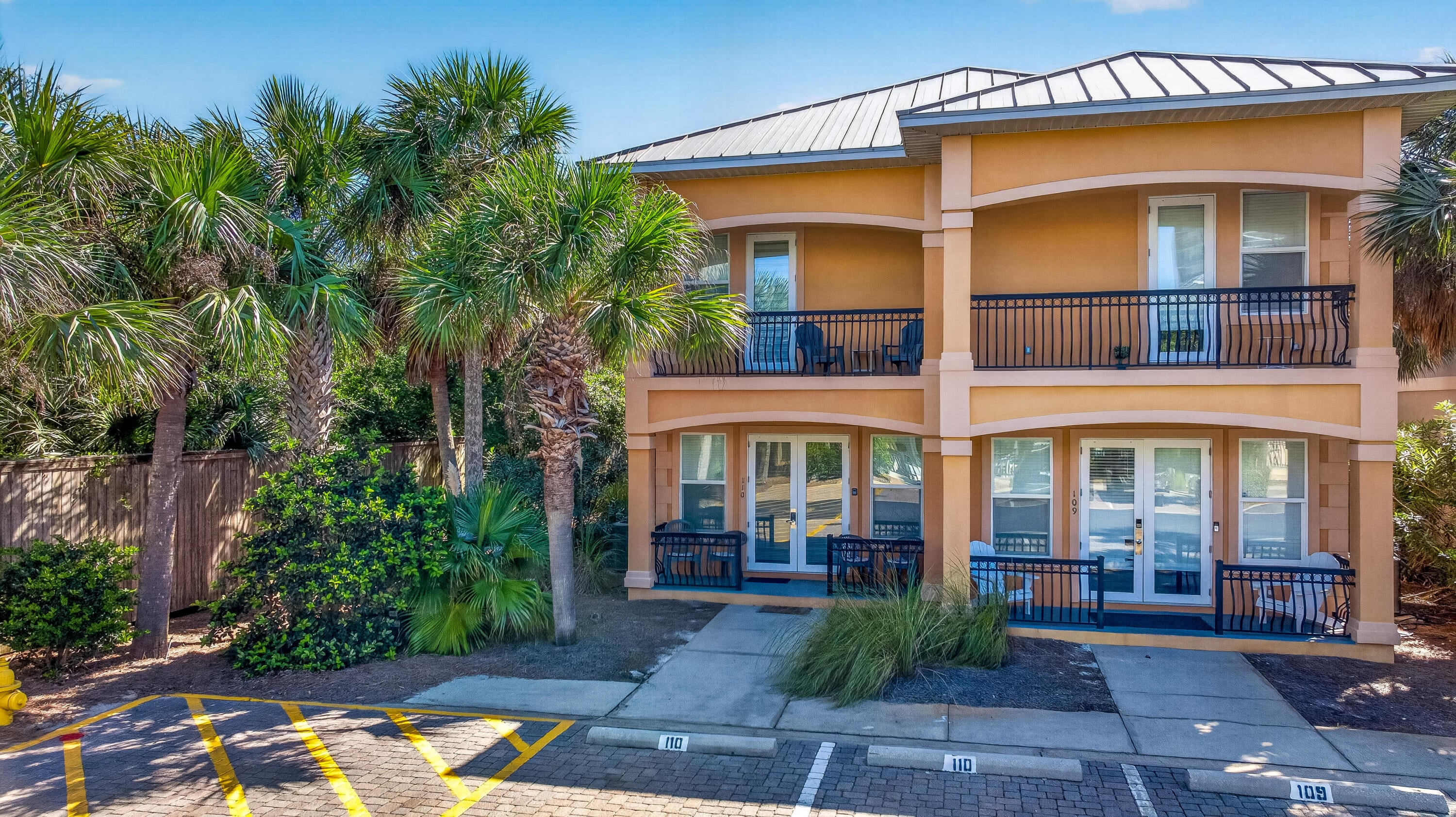 Coastal living meets rental-ready convenience in this beautifully maintained 3-bedroom, 3-bath residence at Miramar Beach Villas. Ideally positioned just across the street from private beach access, this inviting condo offers an easy beach lifestyle along with access to the community swimming pool. Inside, the well-designed layout features upgraded cabinetry, granite countertops, stainless steel appliances, luxury vinyl plank and tile flooring, and updated furnishings and décor throughout. A beautifully renovated bathroom in the primary suite, is a true highlight, featuring a fresh, modern design with a freestanding soaking tub, dual vanity, striking herringbone tile accent wall, and a spacious glass-enclosed walk-in shower. The crisp finishes and thoughtful details give the space a polished, spa-like feel. The upstairs landing adds valuable versatility with built-in bunk accommodations, a washer and dryer, and a convenient work or desk area. Multiple outdoor living spaces--including front and rear balconies on the second floor and covered front and rear porches on the first--provide plenty of room to relax and enjoy the coastal surroundings. Well maintained inside and out, this property offers a wonderful opportunity as a vacation rental, second home, or full-time coastal retreat--all just moments from the sugar-white sands and emerald waters of Miramar Beach.