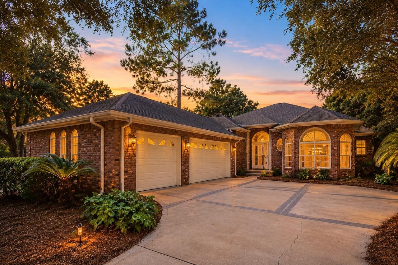 Come experience the quintessential Niceville lifestyle here at 300 Piney Creek Cv; a custom-built 3 Bedroom, 2 1/2 Bath single-level home, with an oversized 3-car garage, nestled on a desirable corner lot spanning nearly half an acre in the prestigious Swift Creek neighborhood where community charm meets unparalleled convenience.

This sought-after enclave is perfectly positioned for those seeking a balance of professional proximity and coastal leisure. From the moment you arrive, the manicured landscaping and quality architecture set a sophisticated tone that carries throughout every inch of this well-maintained residence.

Step through the front door to find a tumbled-marble entry wall that perfectly complements the warmth of the Australian chestnut wood floors. Just off the foyer, there is a spacious home office/flex space features floor-to-ceiling bay windows, with adjacent half-bath; perfect as a work-from-home office, playroom, or as an additional overnight guest room. The open-concept layout of the home features high ceilings throughout and a seamless flow between the dining areas and the expansive great room. Here, a custom fireplace and floor-to-ceiling sliding glass doors out to the sunroom/porch room create an inviting atmosphere for both quiet evenings and elegant entertaining.

The heart of the home is the gourmet kitchen, a chef's dream outfitted with custom cabinetry, premium stainless steel appliances--including a gas stove and wall oven - together with a cent er island. It opens to an oversized breakfast area and a comfortable living space accented by built-in shelving and designer finishes. For those seeking a true indoor-outdoor lifestyle, the "3-season" sunroom features Eze-Breeze bronze-tinted windows, offering a tranquil spot to enjoy the breeze without the elements, leading out to an expansive patio perfect for summer grilling.

The large primary suite serves as a private retreat, complete with a sitting area and a spa-inspired bathroom featuring dual vanities, a whirlpool tub, separate shower, and an oversized walk-in closet. The split floor plan ensures privacy for guests or a home office, while the functional laundry room provides ample cabinetry and workspace.

Beyond its aesthetic appeal, this home is engineered for peace of mind and convenience. It boasts a whole-house Generac generator (recently serviced) that protects the entire property automatically, an oversized 3-car garage to house all your outdoor gear, a whole-house vacuum system, and abundant attic storage. A brand new HVAC system and water heater have just been installed, and a new 3-dimensional shingle roof will be installed prior to closing with acceptable offer.

Residents also enjoy the world-class amenities of Swift Creek, including a gorgeous clubhouse, swimming pool, tennis courts, basketball court, park, and scenic nature trails. This is more than just a home; it is a refined lifestyle waiting for its next chapter!

Families will appreciate being within the footprint of Niceville's top-performing, A-rated schools, while military professionals will enjoy a seamless commute to Eglin Air Force Base, 7th Group HQ, Duke Field, and Hurlburt Field Air Force Base, and in close proximity to the i10 interstate corridor just to the north.

Beyond the neighborhood's peaceful manicured streets, the best of the Emerald Coast awaits! You are just a short drive from the world-famous sugar-white sands and emerald waters of Destin and the scenic beauty of 30A. Whether you're spending a quiet afternoon under the neighborhood's towering oaks or heading out for a day of luxury on the Gulf, Swift Creek offers the perfect home base for a life of convenience within an upscale sought-after community. Don't delay in making this beautiful home yours!