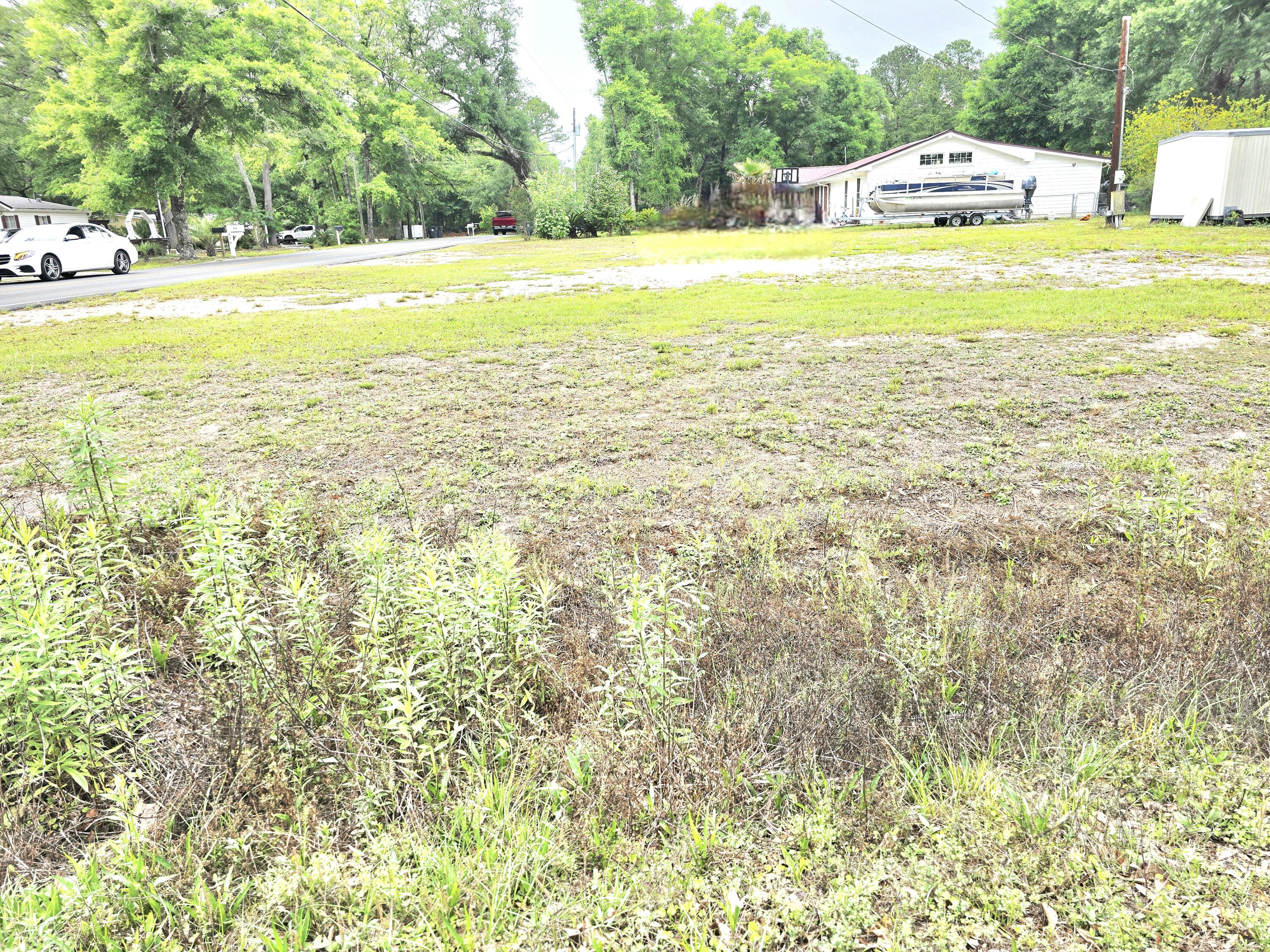 Prime opportunity in growing Freeport, FL!  At Just  minutes from the  upcoming  Walmart  of  US331 South, this flat, clear corner lot is ready for your new home or investment. Approx. ½ mile from US-331 & Hwy 20, offering easy access  to  all directions, North, South, East and West. Enjoy the convenience of nearby amenities while being under 30 minutes from the white sandy beaches of the Gulf. Bring your builder, no clearing or delays!