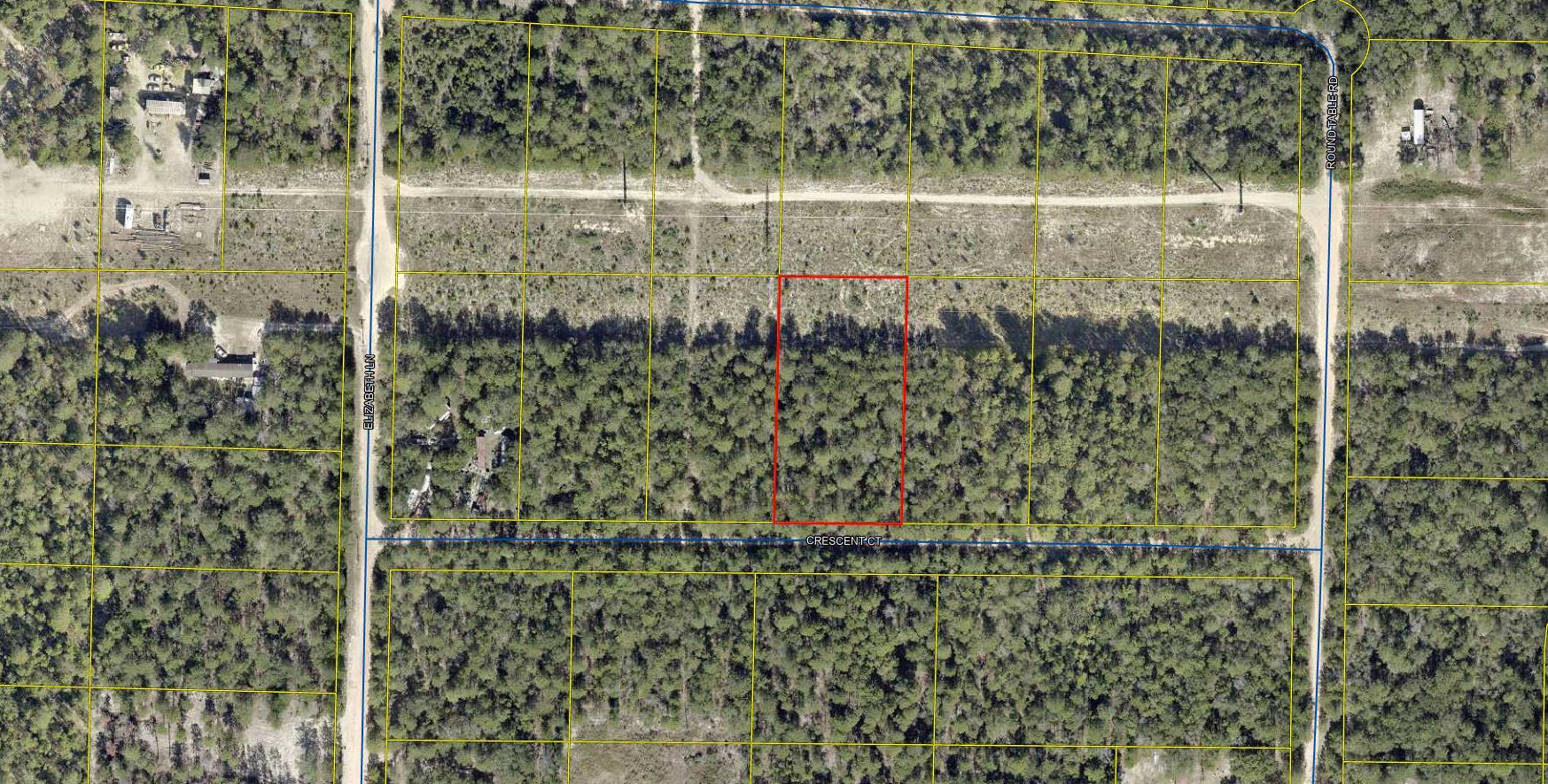 Partially wooded  .964 acre  lot in Unit 5 of Oakwood Hills, an area which is currently being developed and growing. Numerous distribution centers under development, such as Amazon. Zoning is Rural Residential / Rural Low Density which allows Single family residential and mobile homes  See photos for information PER the COUNTY GIS map for soils, flood zone , which is X, zoning, and other pertinent info. Set backs per county F 20 B 15 Sides 7 1/2 . The lot is raw , no tap in fees have been paid, septic needed. Seller has 6 lots total , all connected and available as a package deal