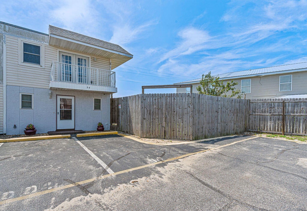 Low HOA Fees! 2 bedroom townhome in Destin. Perfect for primary home or investment property. Features include granite counter tops, tile backsplash, new bathroom vanity, crown molding throughout, smooth ceilings. Even more appealing is the location-in the back, end unit with low traffic and large lot. Pride of ownership shows in this well maintained home. 

Centrally located in the heart of Destin, this property is within walking distance to shopping, grocery stores, banks, churches, retail stores, restaurants, entertainment and just a short drive to the several nearby beach accesses and the Destin Harbor.
Community park right next door offers playground equipment and basketball and tennis courts. Don't forget the community pool for those hot summer days!