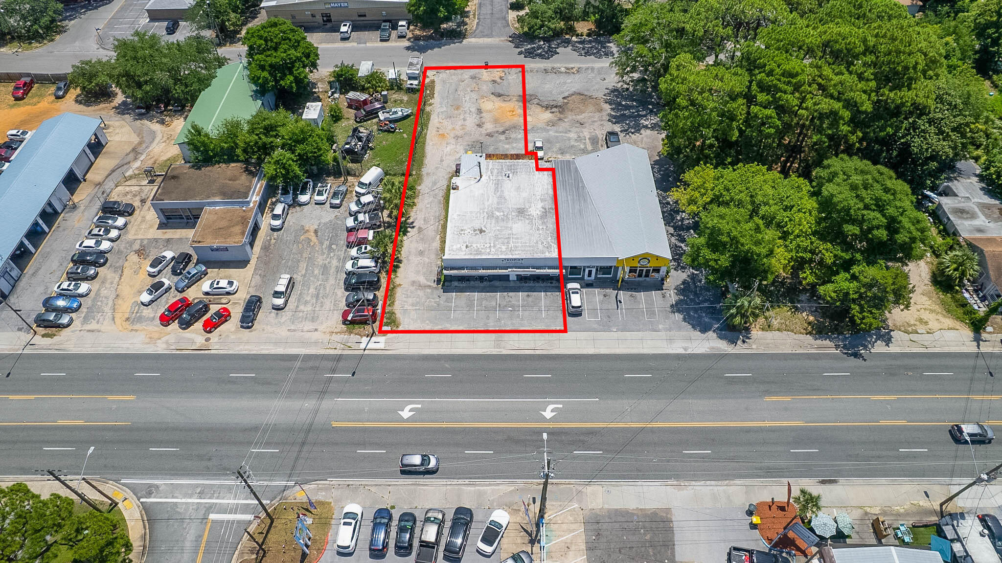 Now available for sale, 53 Beal Pkwy presents an owner-user or investment opportunity in the heart of Fort Walton Beach. Situated on approximately 0.31 acres and zoned General Commercial (CG) within the City of Fort Walton Beach, this ±3,488 SF building offers exceptional visibility with approximately 75 ft. of frontage along Beal Pkwy, plus 60 ft. of rear access along Shell Avenue, creating convenient pass-through circulation and potential drive-thru functionality.

Additional highlights include a 14,400 daily traffic count, ample on-site parking, and positioning within Fort Walton Beach's CRA District, along with close proximity to Downtown FWB, where significant public and private investment is currently underway, including a new multi-family development at 1st Street and Lowery Place and the Brooks Bridge replacement project.

Currently operating as a bar and grill with event space, the property is well-suited for a wide range of retail, restaurant, office, medical, or service-oriented uses, an ideal fit for owner-users, investors, or developers looking to capitalize on this rapidly evolving market.