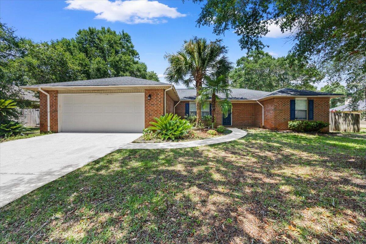 Welcome to this tastefully updated, all-brick home tucked away on a quiet cul-de-sac street offering privacy and a peaceful setting adorned in beautiful oak trees with minimal traffic. Situated on a spacious lot, the fully fenced backyard features a patio with pergola overlooking the beautiful backyard which provides the perfect space for a large shed, pets, play, or entertaining.

Inside, behold all of the updates including bright, fresh paint, new light fixtures and dishwasher, newer microwave and oven, renovated hall bath, new flooring throughout and no carpeting!  You'll find a generously sized kitchen featuring an island and a large pantry for ample storage. The over-sized, inviting living area is centered around a cozy fireplace, while the primary suite offers a tray ceiling that adds a touch of character and charm and a generous-sized bathroom with two walk-in closets and double vanities. 

Whether you're looking for your next home or an investment opportunity, this property offers solid construction, a desirable location, and plenty of potential to make it your own. Don't miss your chance to see all this home has to offer!