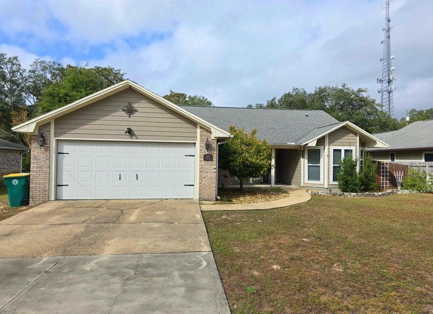 AVAILABLE 08/01/2026 Beautiful Bluewater Bay home with 3 spacious bedrooms and 2 full baths. This is a split bedroom floor plan. The large living room features a fireplace. Kitchen has stainless steel appliances and a breakfast bar.  The sunroom is heated and cooled. Privacy fenced back yard has a firepit with seating area. Tenant occupied, 24 hour notice required. Applicants to verify items of importance such as room measurements and school zones.  No smoking, no vaping. Credit and criminal check required.