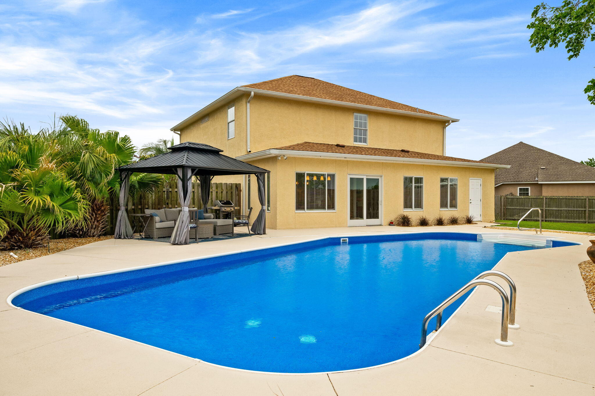 METICULOSULY Cared For, and one of the LOWEST PRICED per sq/ft 4-bedroom homes with a pool in all of Panama City!!!

With all the incredible updates, it's hard to believe that this price is real. But rest assured... these original owners have spared absolutely no expense in ensuring this custom-built home is ready to create amazing lifelong memories for its next loving family. 

From the moment you step inside, you find yourself instantly greeted with soaring ceilings, endless natural light, and a feeling of ''home'' that you simply don't find in most places. 

From the newly updated tile flooring, to the completely remodeled bathrooms, to the fresh paint and updated fixtures throughout... this thoughtfully designed home offers everything you could dream of - and so much more. And the master bedroom is truly a sight to behold!!!  You simply will not find a larger room with limitless space when it comes to winding down in the evenings.  

And if you are in Florida because of the impeccable weather, then the backyard is a peaceful oasis unlike any other home in the area. Perfectly landscaped and offering incredible privacy, you will entertain worry free for years to come with a refreshing in-ground saltwater pool (featuring a new liner and freshly painted pool deck) and an all-new aluminum hardtop gazebo! The exterior has an all-new roof, the attic has been updated with spray foam, and the entire home has been freshly painted with an incredibly durable "rubberized" stucco paint - meaning that you will enjoy low utility bills and carefree homeownership for years to come!

Perfectly situated on a peaceful cul-de-sac in the highly desirable Northshore community, this pristine home is within a few minutes to everything you might need, all while being nestled into one of the most established yet peaceful areas of town. 

Please go take a look at all the other homes available... Don't just look at the pictures, actually go and see how each of them "feel." Then, please come be our guest. Simply walking in the door, you will know in your heart that this one truly is special in every way possible.

Welcome Home!