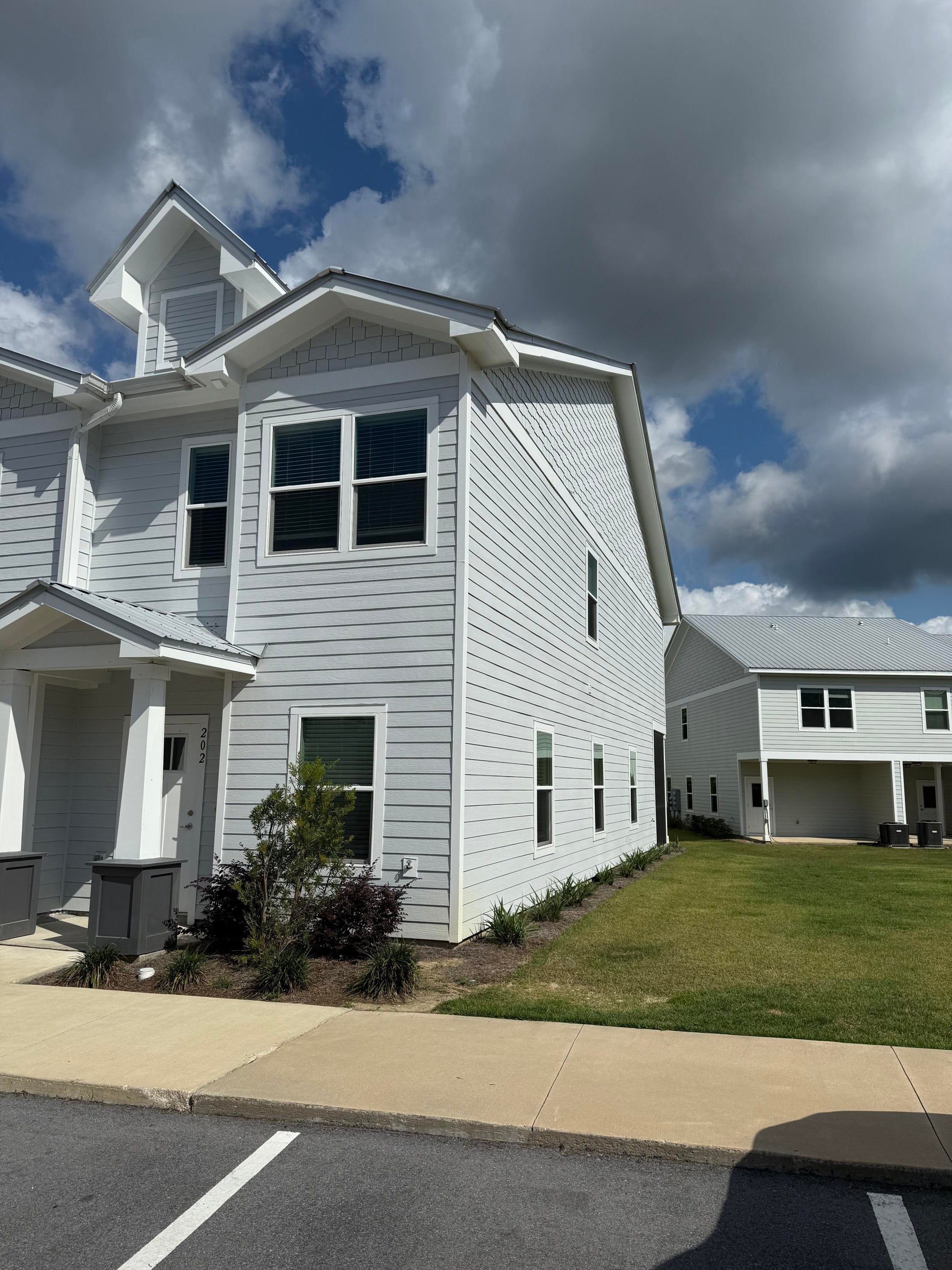 Gorgeous 3-bedroom 2.5 bath townhome located in the heart of Freeport! Beautiful LVP wood floors throughout the property. Windows brighten up the living room and kitchen with quartz countertops & stainless-steel appliances. Half bath off the kitchen for easy access. Enjoy the bonus area that can be used for small office, reading nook or kids play area. Upstairs has large Master suite with large closets and master bath with double vanity. Two spacious guest bedrooms.  Enjoy the screened-in back porch without worrying about bugs or unpredictable weather.
