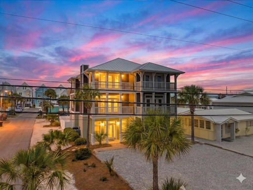 FINANCIAL POWERHOUSE! This prime beachside asset commands an Estimated Annual Gross Rental Revenue between $85,000 - $90,000. Designed for compounding returns, this revenue is projected to increase year-over-year. By capturing highly valuable repeat guests, you will maximize occupancy rates and secure a rapidly increasing ROI from day one. Full historical data (coming soon) and future projections are available upon request. This highly-rated VRBO property is in the top 10% of guest reviews for the area, with 139 reviews in total. LUXURY COASTAL LIVING MEETS A LEGACY OF MEMORIES. This isn't just a beach house; it is a ''Love-Held'' sanctuary where generations have gathered to discover the very best of Northwest Florida. From the quiet shores of Cape San Blas to the historic charm of Pensacola, this home has served as the ultimate home base for family reunions and life-changing adventures. The current owners' children are reluctant to let it go--and for good reason. It has been a magical learning environment where the kids grew up alongside the Gulf, learning the pride of homeownership and the joy of coastal stewardship. While the family is ready to move on to their next chapter, they leave behind a home filled with soul and a foundation built for a lifetime of new traditions. PRISTINE BEACHSIDE ELEGANCE JUST STEPS FROM THE SHORE. Located on the coveted beach side of Thomas Drive--just three lots off the emerald waters--this 2,934 (total sq. ft.) Tuscan-inspired residence offers breathtaking Gulf views from the third level. The interior is a masterclass in luxury, featuring 10-foot ceilings on the first floor, granite countertops, and high-end stainless appliances. Designed to sleep 10, the layout includes three large bedrooms plus two built-in bunk areas, ensuring plenty of space for everyone to spread out. With four covered balconies, two electric fireplaces for ambience/light only, a jetted master tub, every detail has been curated for comfort and sophisticated beach living. YOUR PRIVATE OUTDOOR OASIS WITH UNMATCHED UTILITY. Step outside into your own private retreat featuring a gunite pool, recently upgraded with a new pump and filter (2022). This ''Twin Home'' attached single unit offers a rare advantage: a solid concrete divider wall that ensures absolute privacy and zero sound transfer between sides. Unlike most beach properties, parking is never an issue here. The expansive driveway accommodates up to 8 vehicles (4 side, 4 front), providing ample space to park your RV or boat right on the property--a true rarity so close to the Gulf. A TURN-KEY, COMPLETELY FURNISHED INVESTMENT. Whether you are seeking a premier primary residence or a high-performing vacation asset, this property is being sold fully furnished and ready to deliver from day one. The home features a brand-new downstairs water heater (2024), and a newer upstairs HVAC. Perfectly positioned in the quieter area of Panama City Beach, you are just a short drive from the world-class dining and shopping of 30A, Destin, Mexico Beach and Port St. Joe, while remaining tucked away in a peaceful, highly flexible coastal pocket.