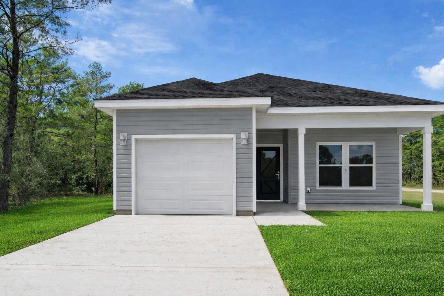 Beautifully crafted new construction home by Southern Home Solutions, a trusted local builder known for quality craftsmanship. This 3-bedroom, 2-bath home with a 1-car garage features an open and inviting layout with 9-foot ceilings, wall-to-wall LVP flooring, and ceiling fans in every room. The kitchen shines with quartz countertops and modern finishes, perfect for both everyday living and entertaining. Located in Flood Zone X, this home offers peace of mind and long-term savings. Enjoy the added confidence of a 1-year builder's warranty. Ideally situated just minutes from shopping, interstate for easy commute to neighboring cities,  beaches, the Springs, and the newly opened Shoal River Headwaters State Park.